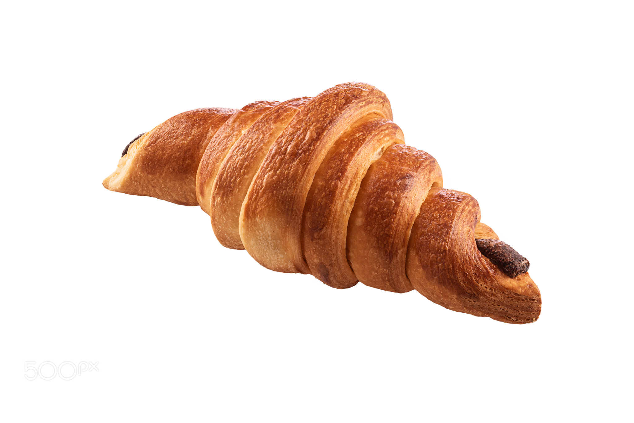 Freshly baked french croissant isolated on white background