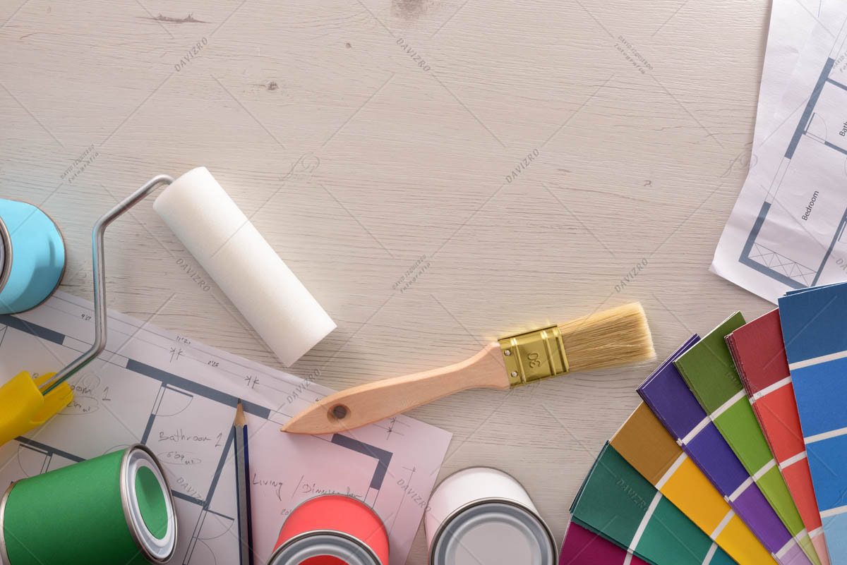 Decorator table with painting project and housing renovation bac