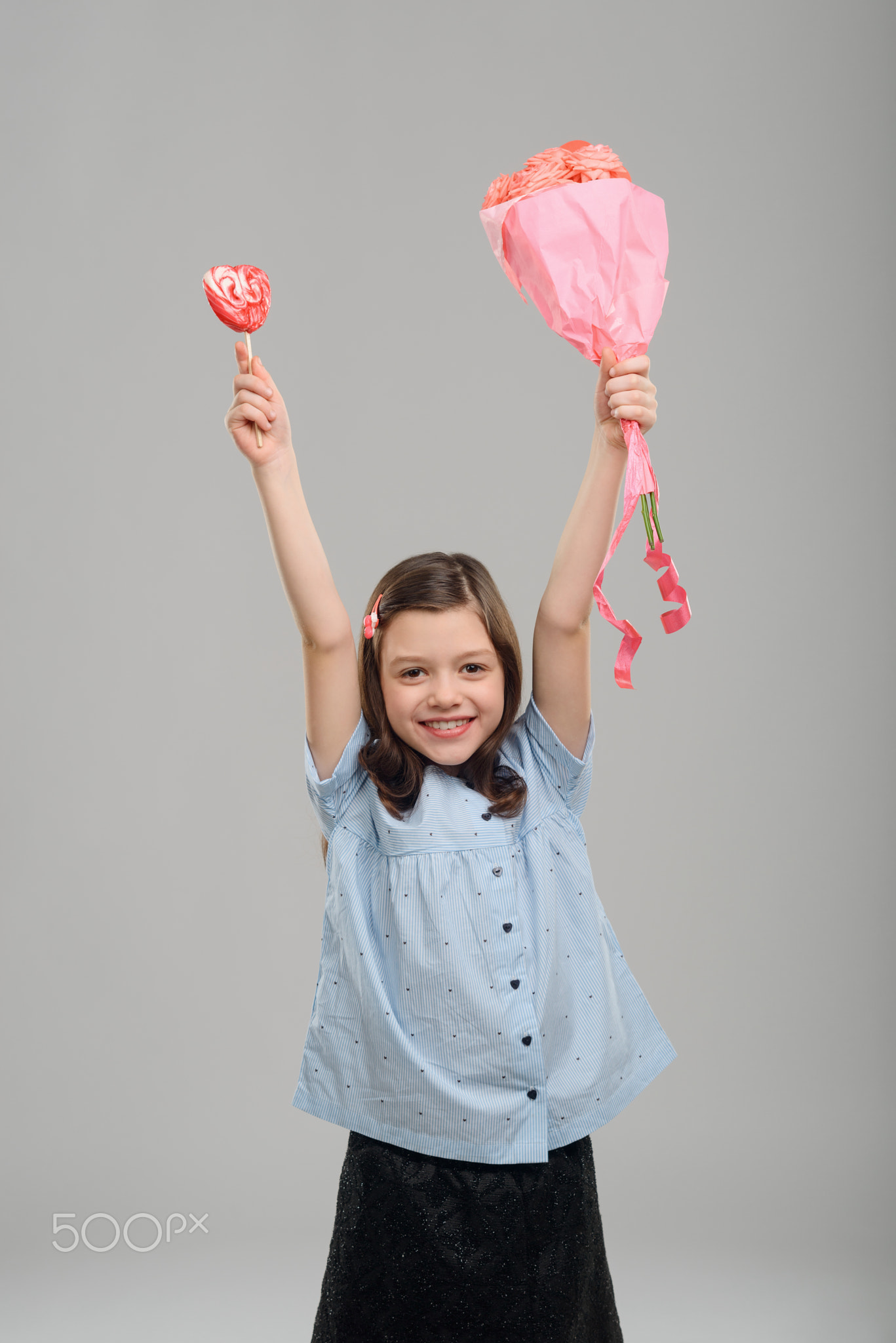 Joyful girl with her gifts