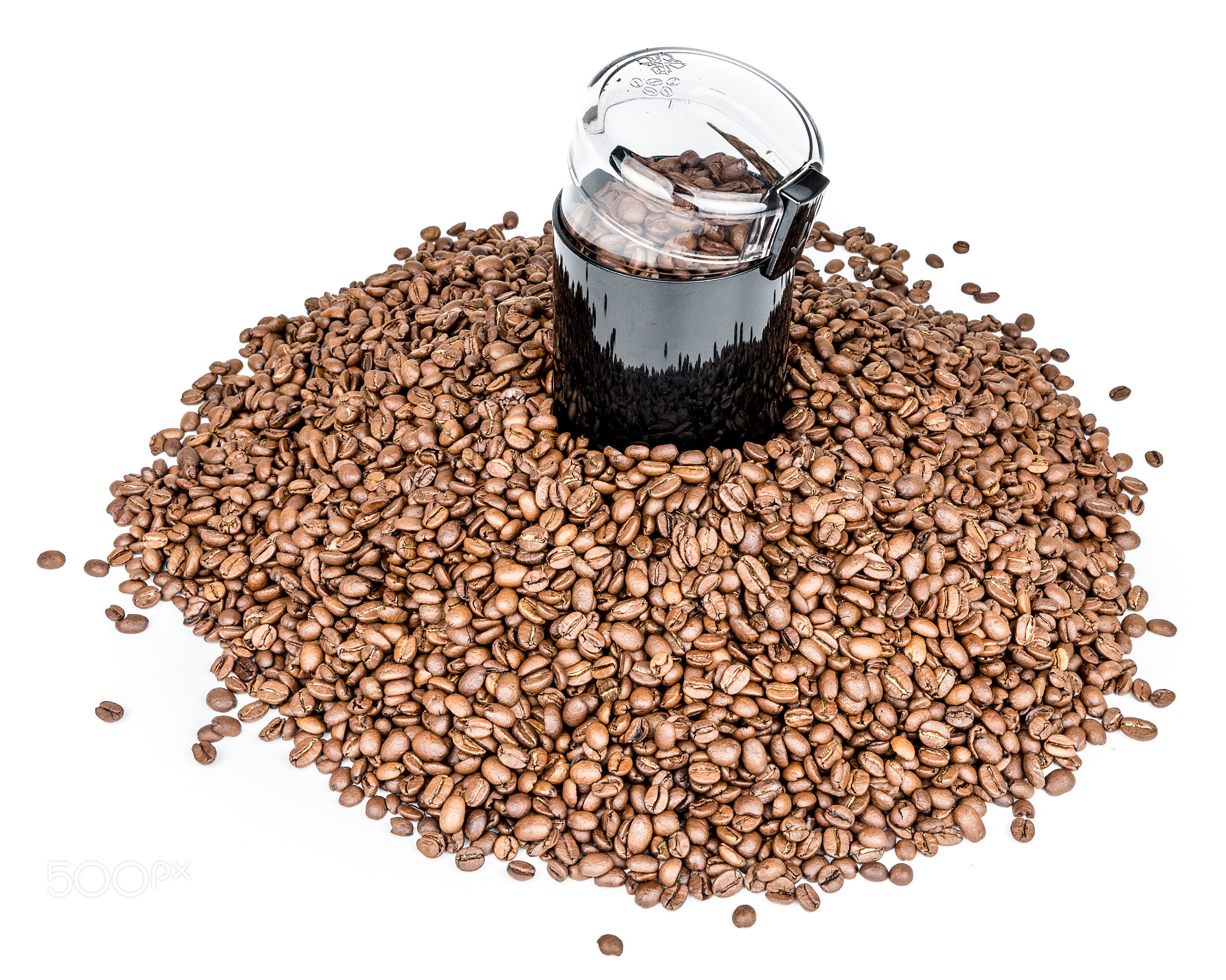Coffee mill and pile of coffee beans - Isolated