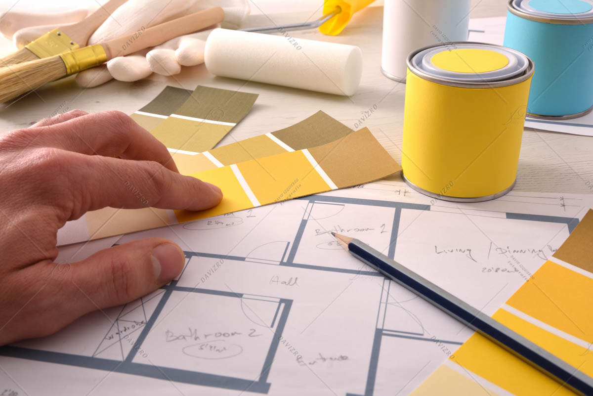 Decorator choosing yellow color for interior home painting proje