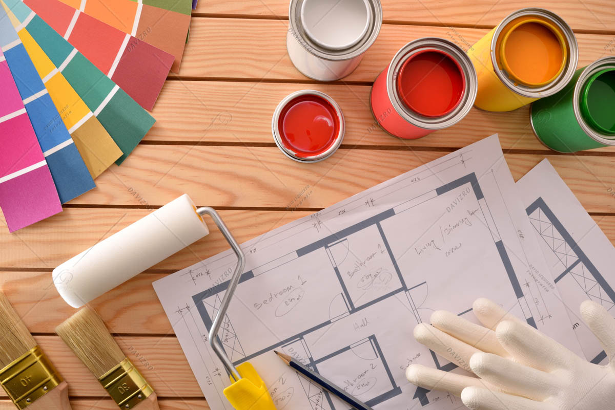 Colored paint for decoration in homes on wooden slatted table