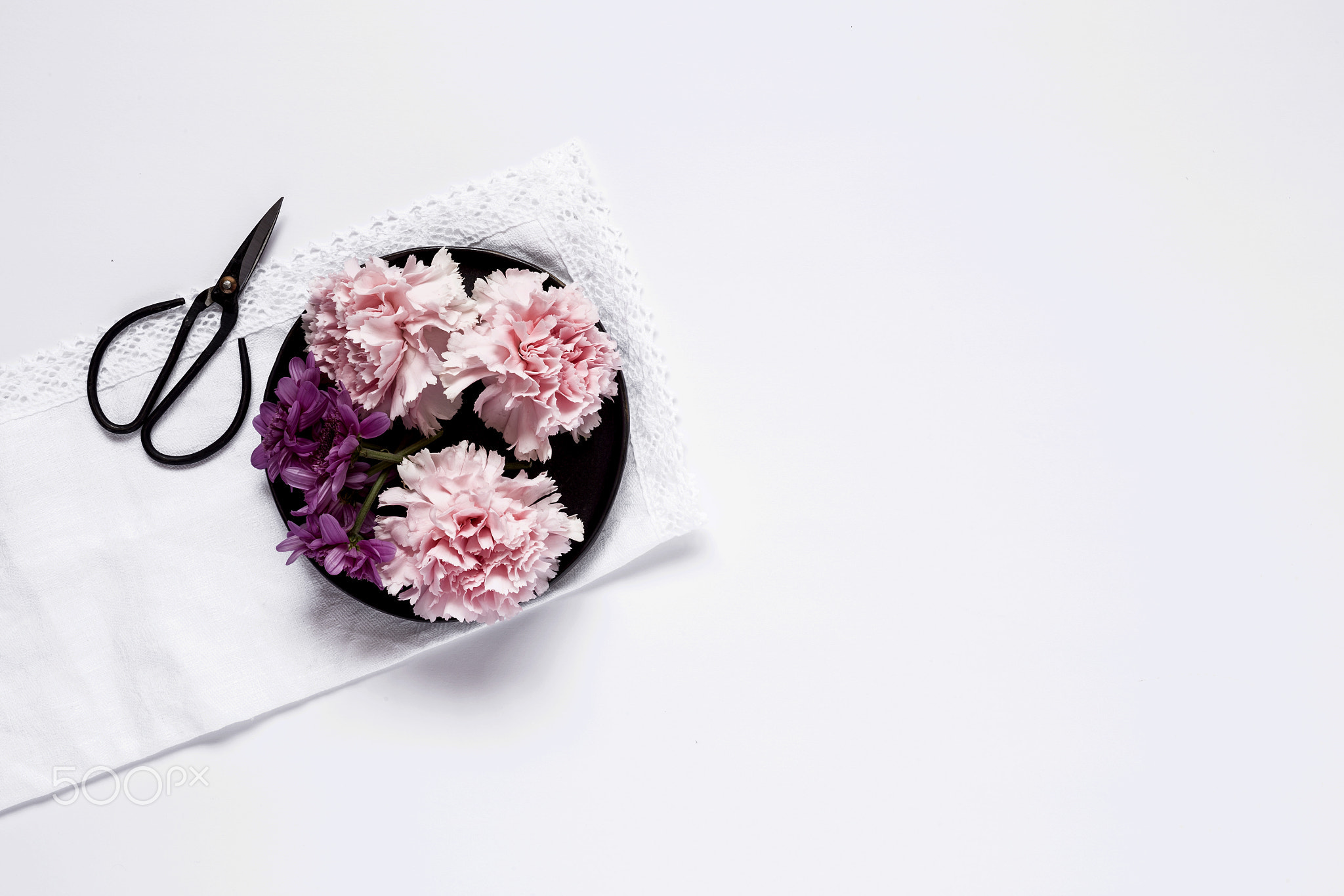 Flowers on white background. Flat lay, top view