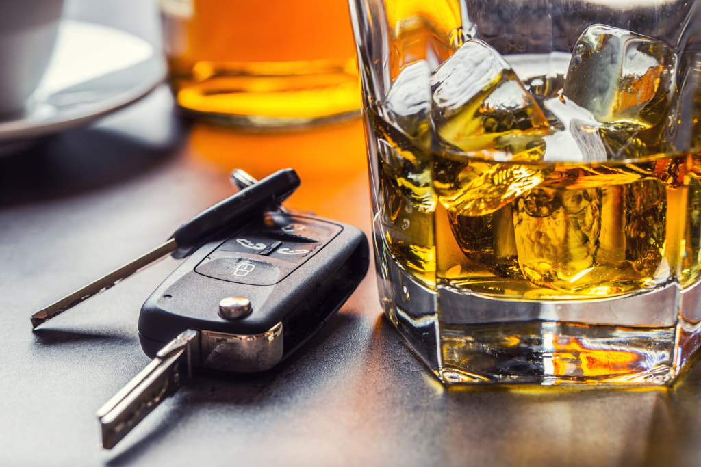 Car keys and glass of alcohol on table. by Marian Vejcik Slovcar on 500px.com