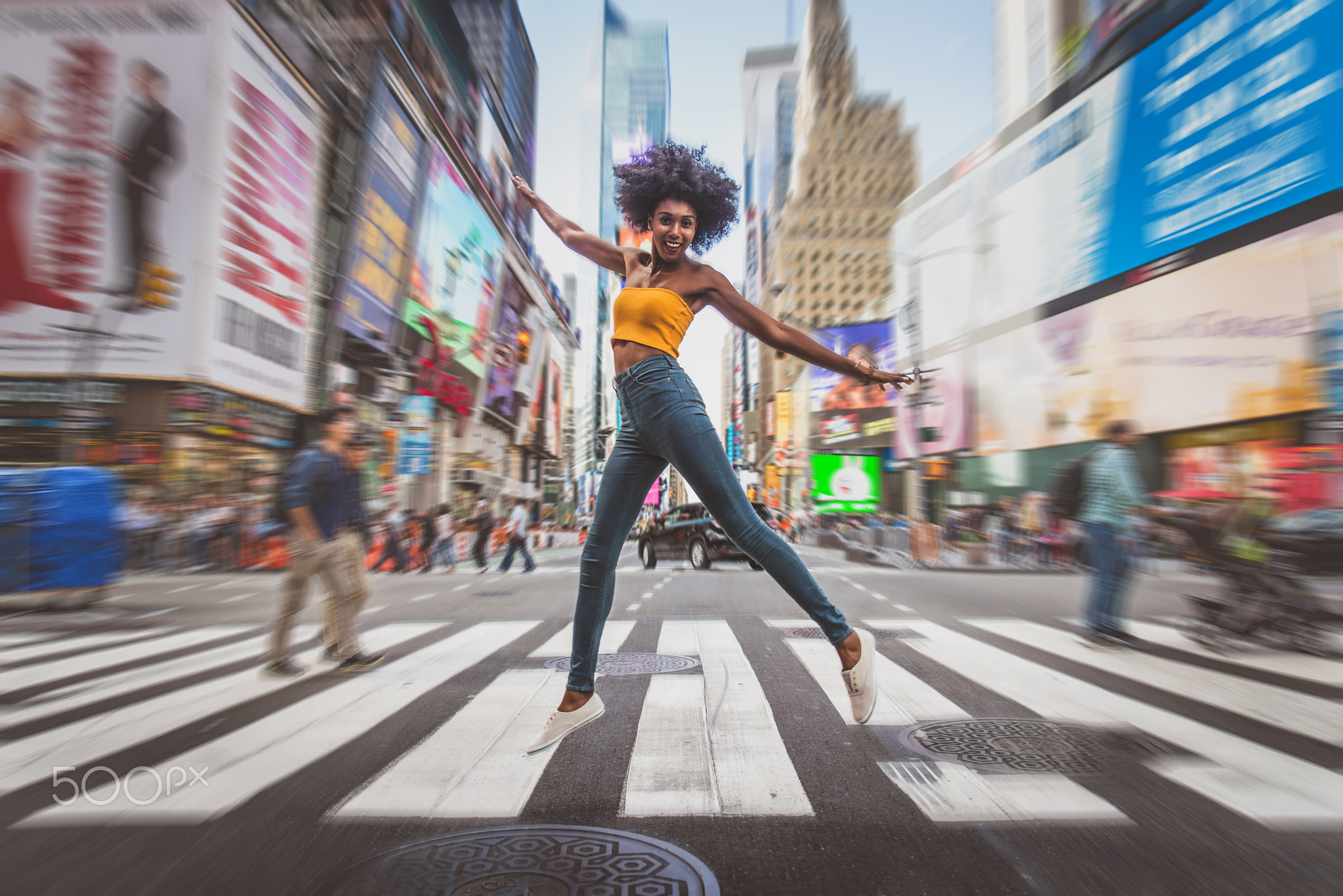 Young beautiful girl walking in Time square, manhattan. Lifestyl