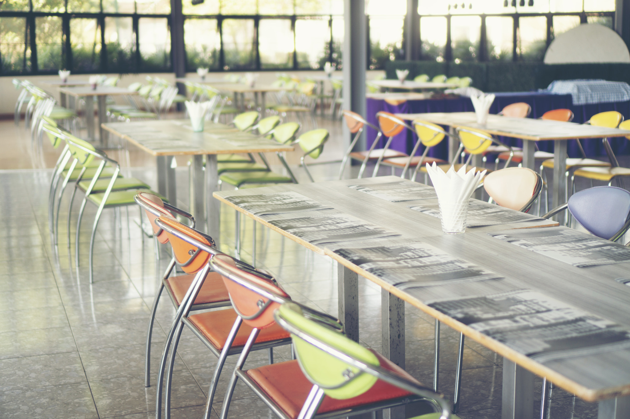 Tables and chairs empty in canteen