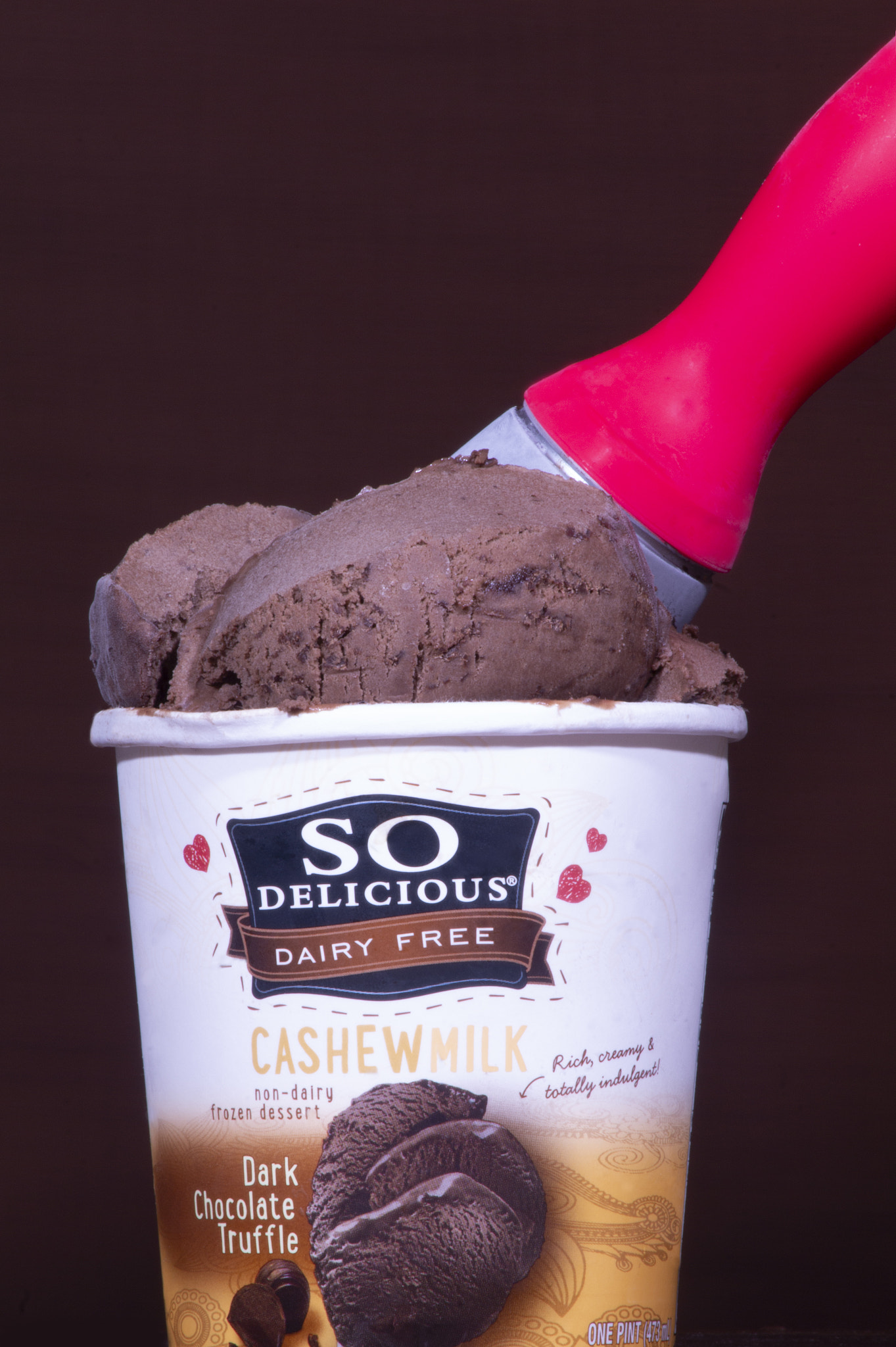 Chocolate cashew milk ice cream.: The title is self explanatory. I will most likely hand this in for a college class project based on studio commercial photograph and I will be graded on this project so please leave a comment about how you all honestly feel about all of the good and bad aspects of this image. Like button clicks are all appreciated. Thanks.