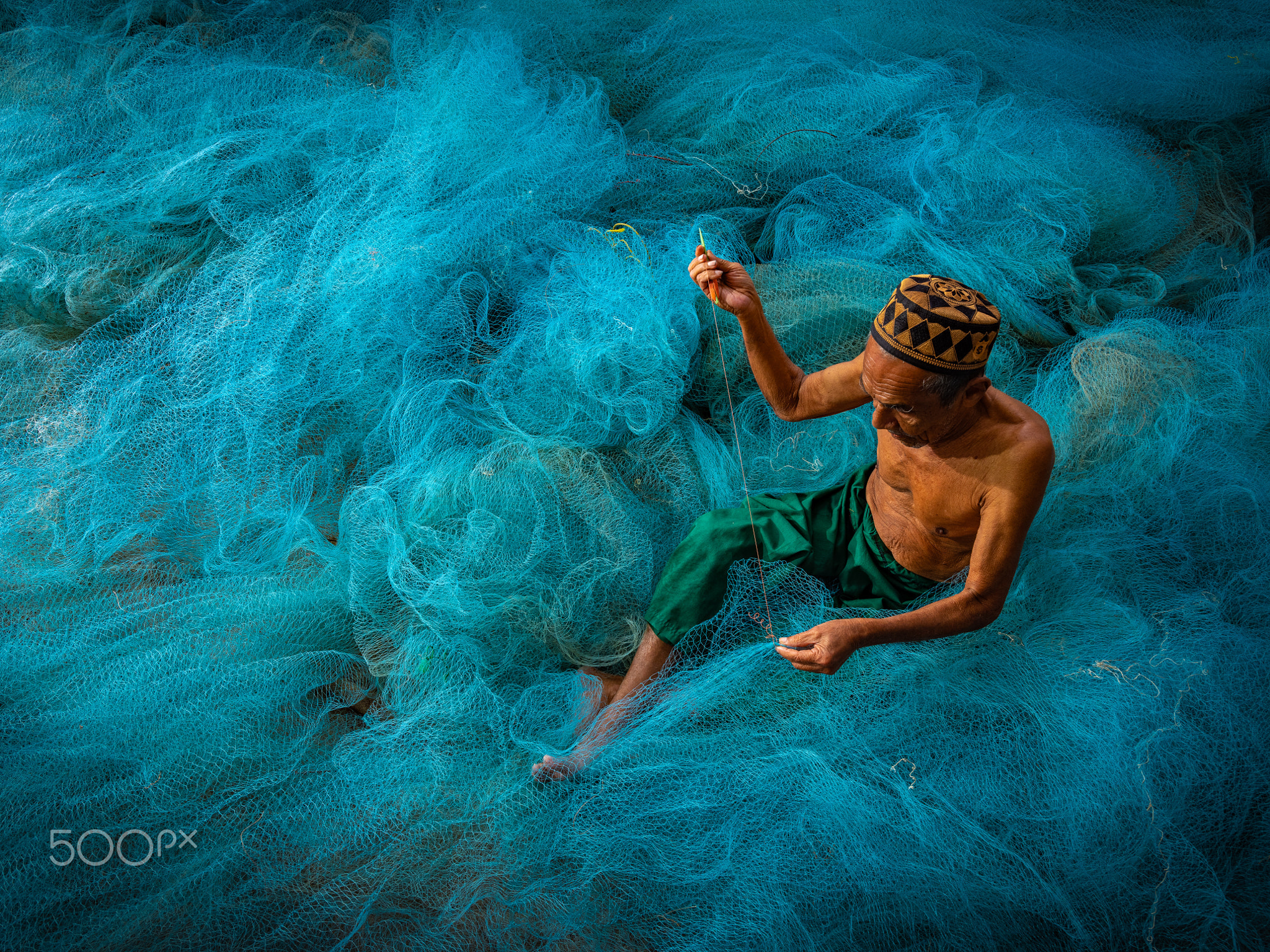 Fisherman with fishing net