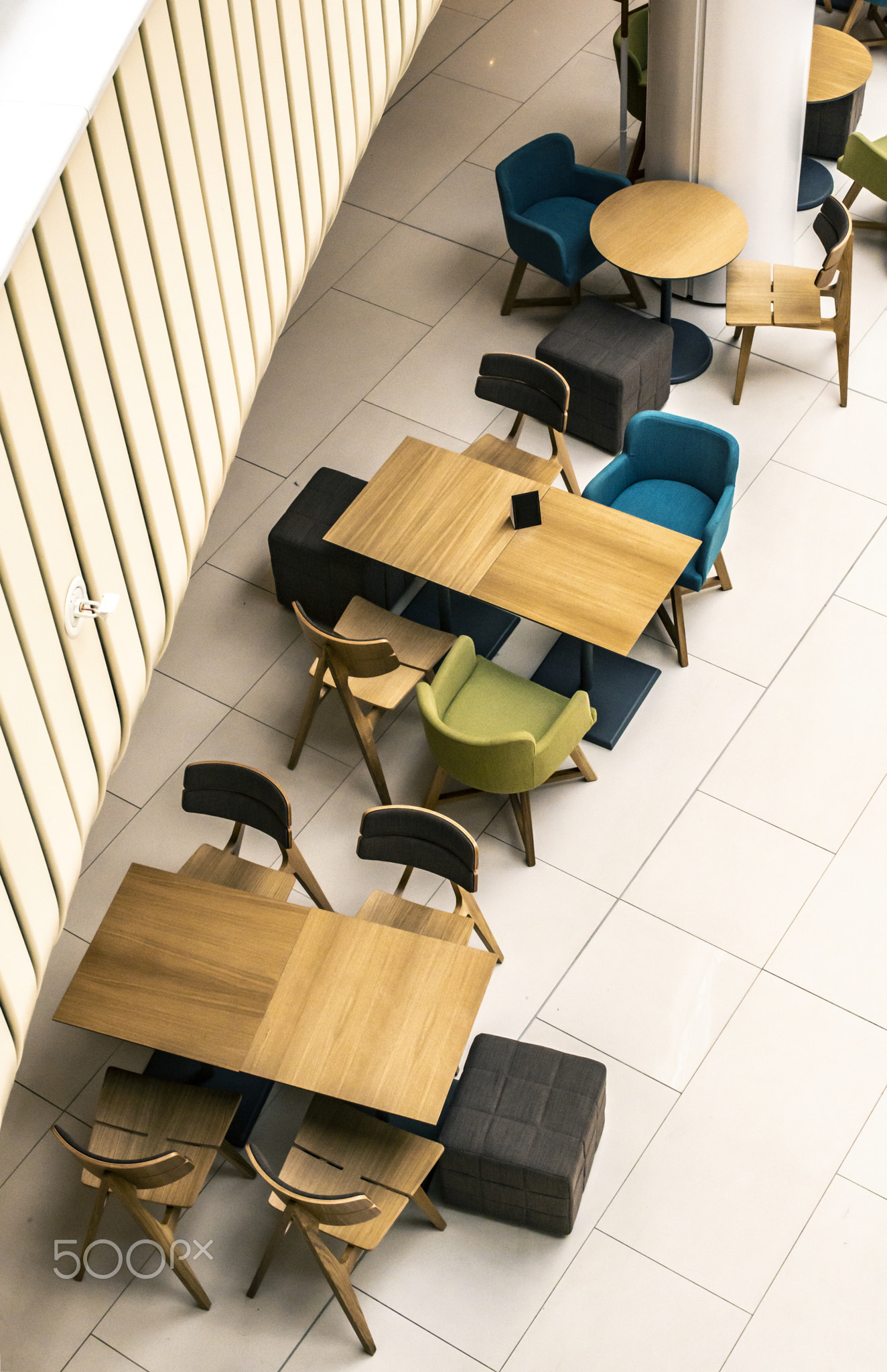 Tables and chairs in cafe. ontemporary design of bar furnishings