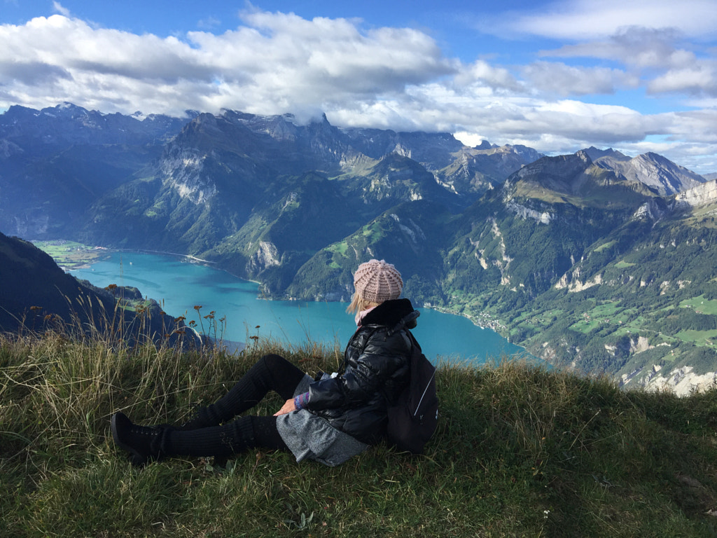 woman looking out over mountain dale