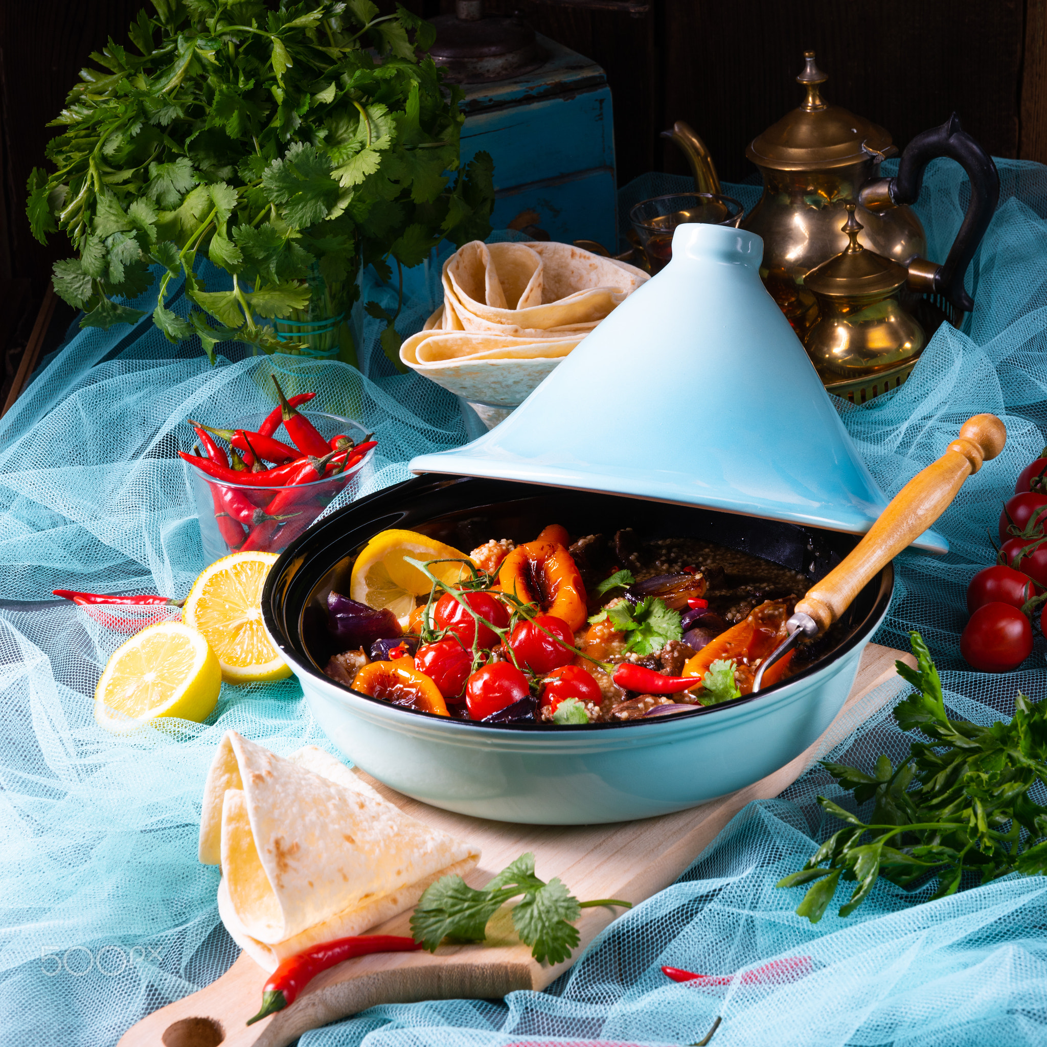 Tasty spicy beef with various vegetables cooked in tagine