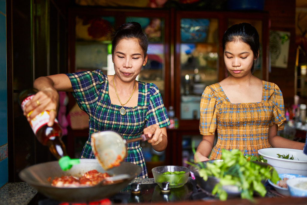 thai mother and daughter cooking red curry together in tradional home kitchen by Joshua Resnick on 500px.com
