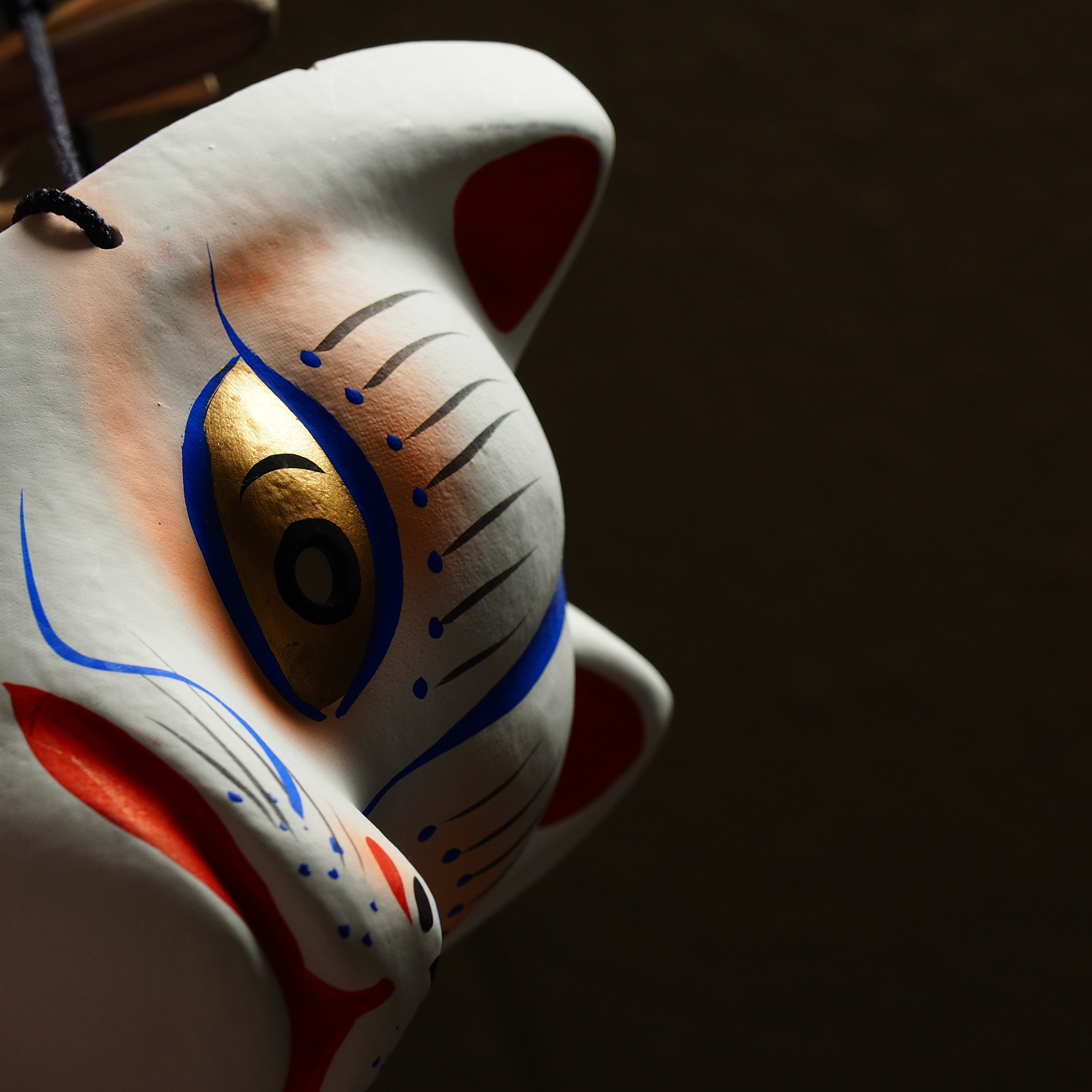 a foxy mask of Fushimi Inari