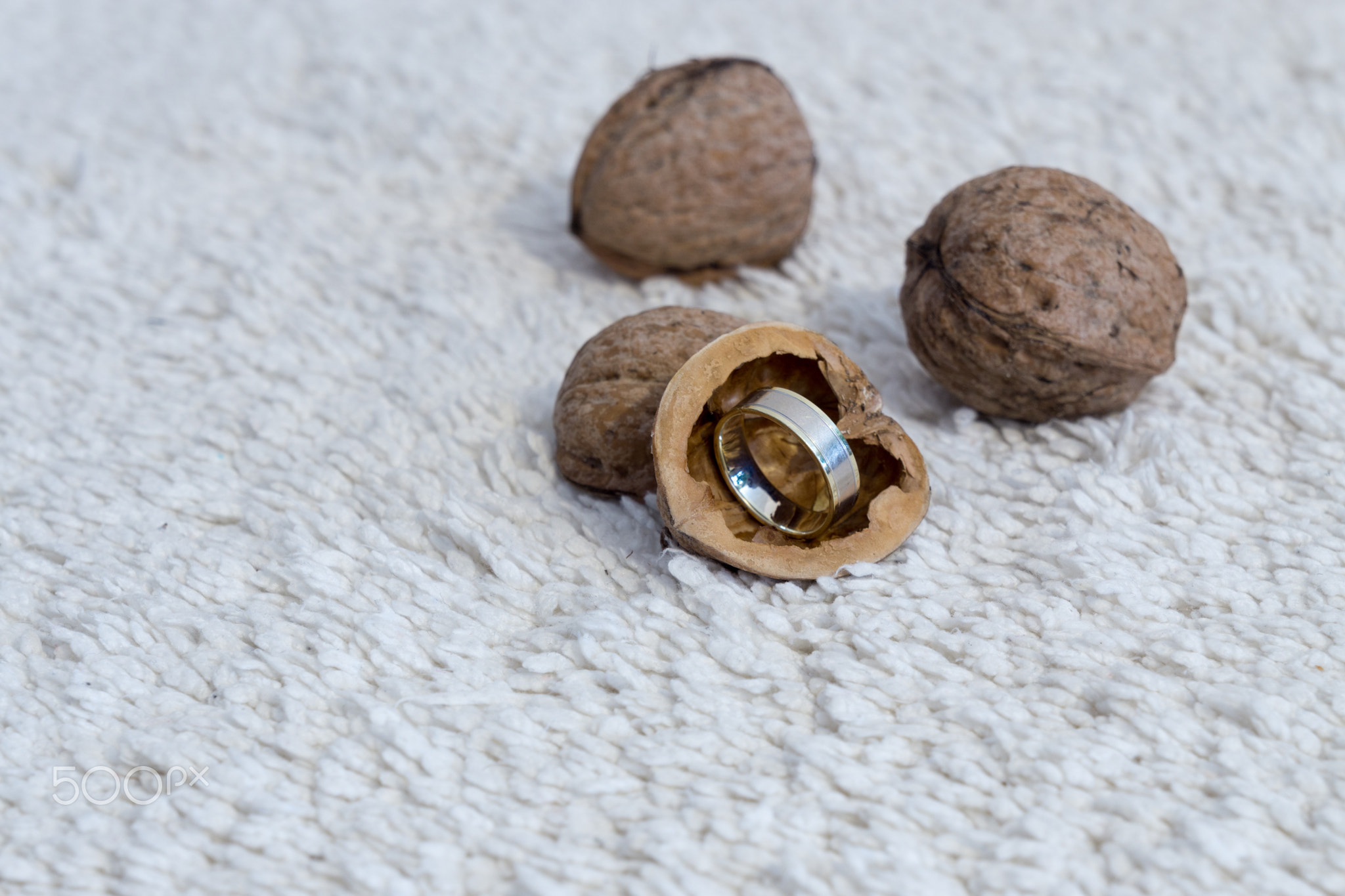 Wedding ring in the walnut
