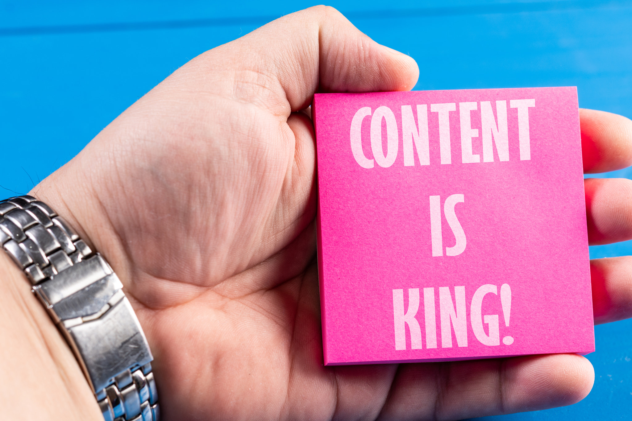 Content Is King Concept Text On The Sticky Paper Notes In The Hand
