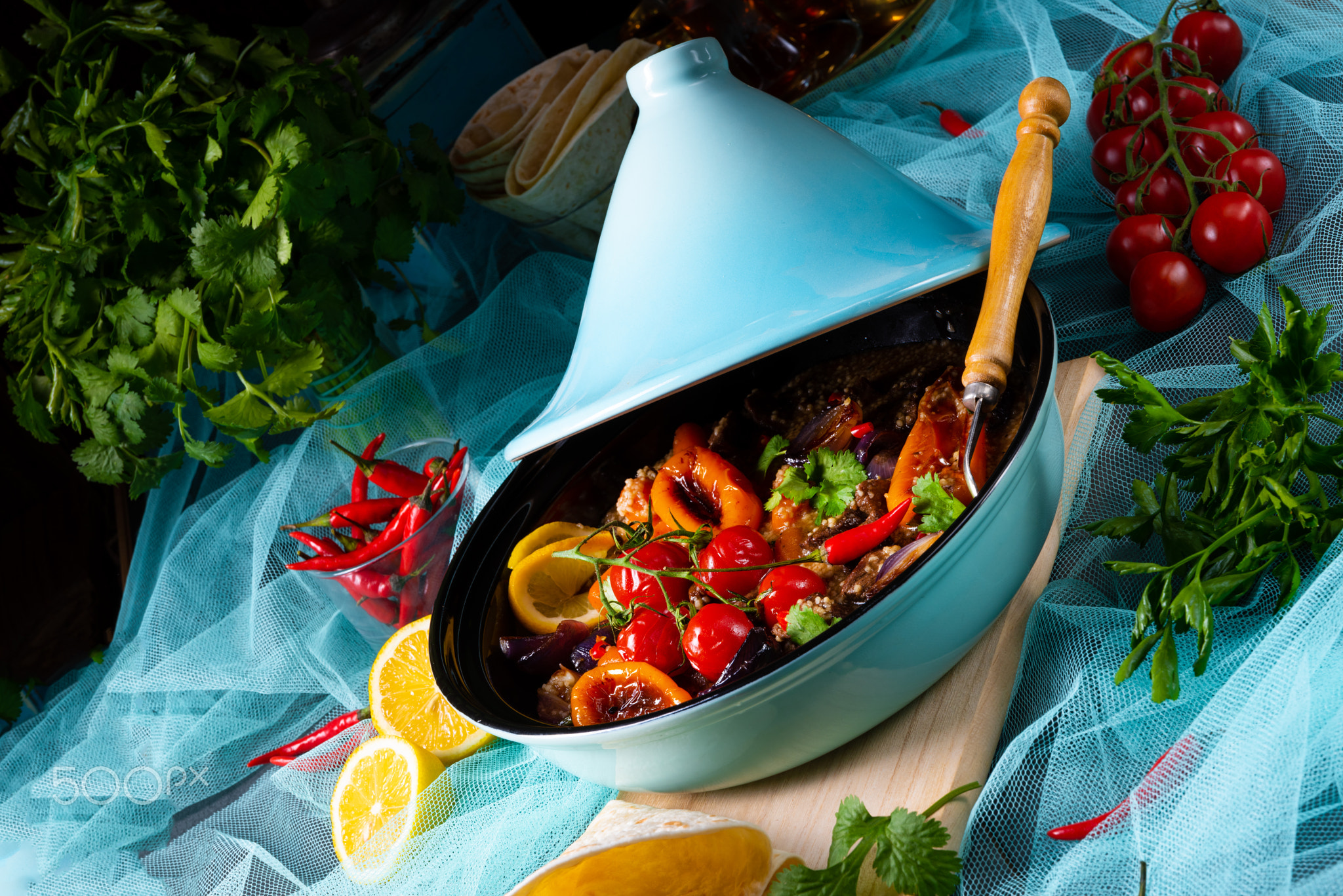 Tasty spicy beef with various vegetables cooked in tagine