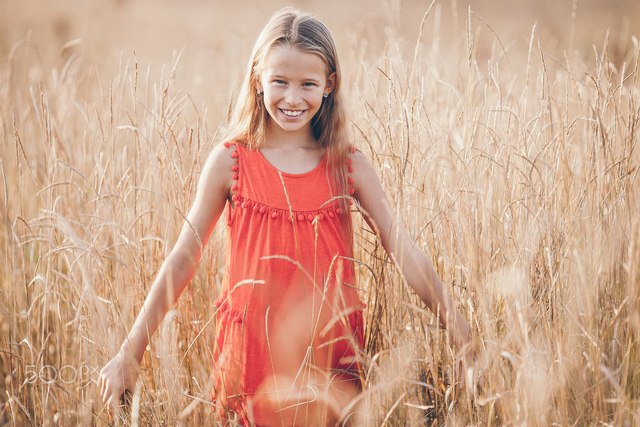 Girl running fast and holding airplane toy