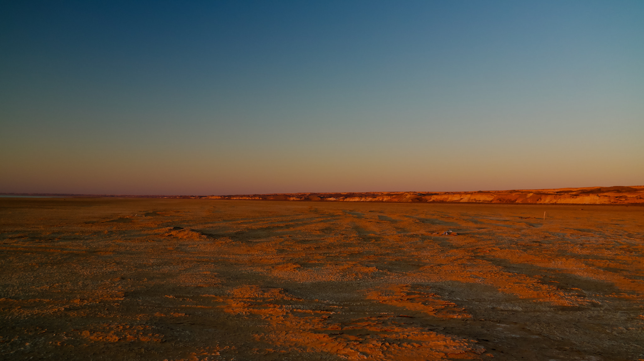 Panorama view to Plateau Ustyurt from the edge of Aral sea near Aktumsuk cape at sunset,...