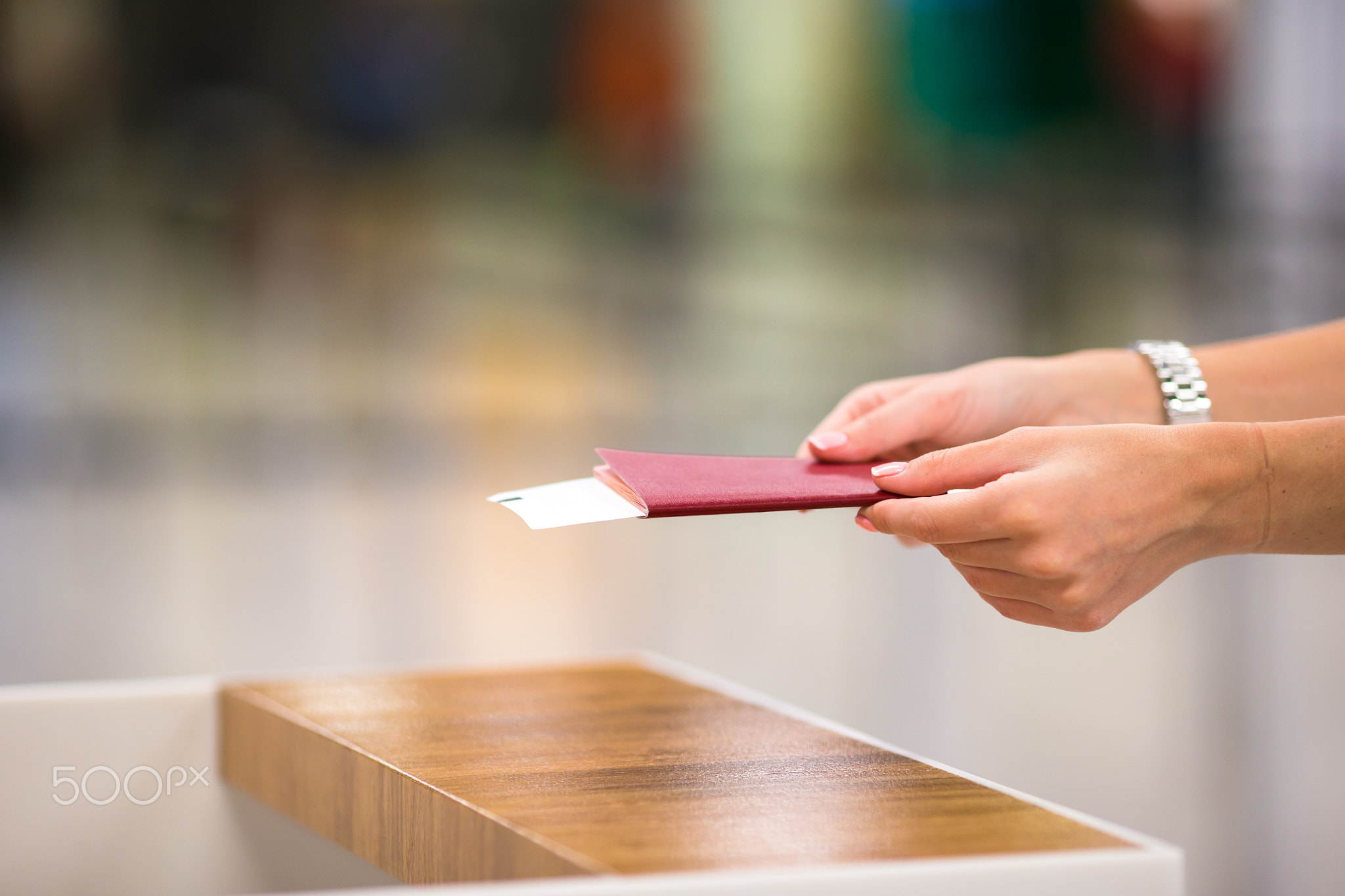 Closeup passports and boarding pass at airport indoor