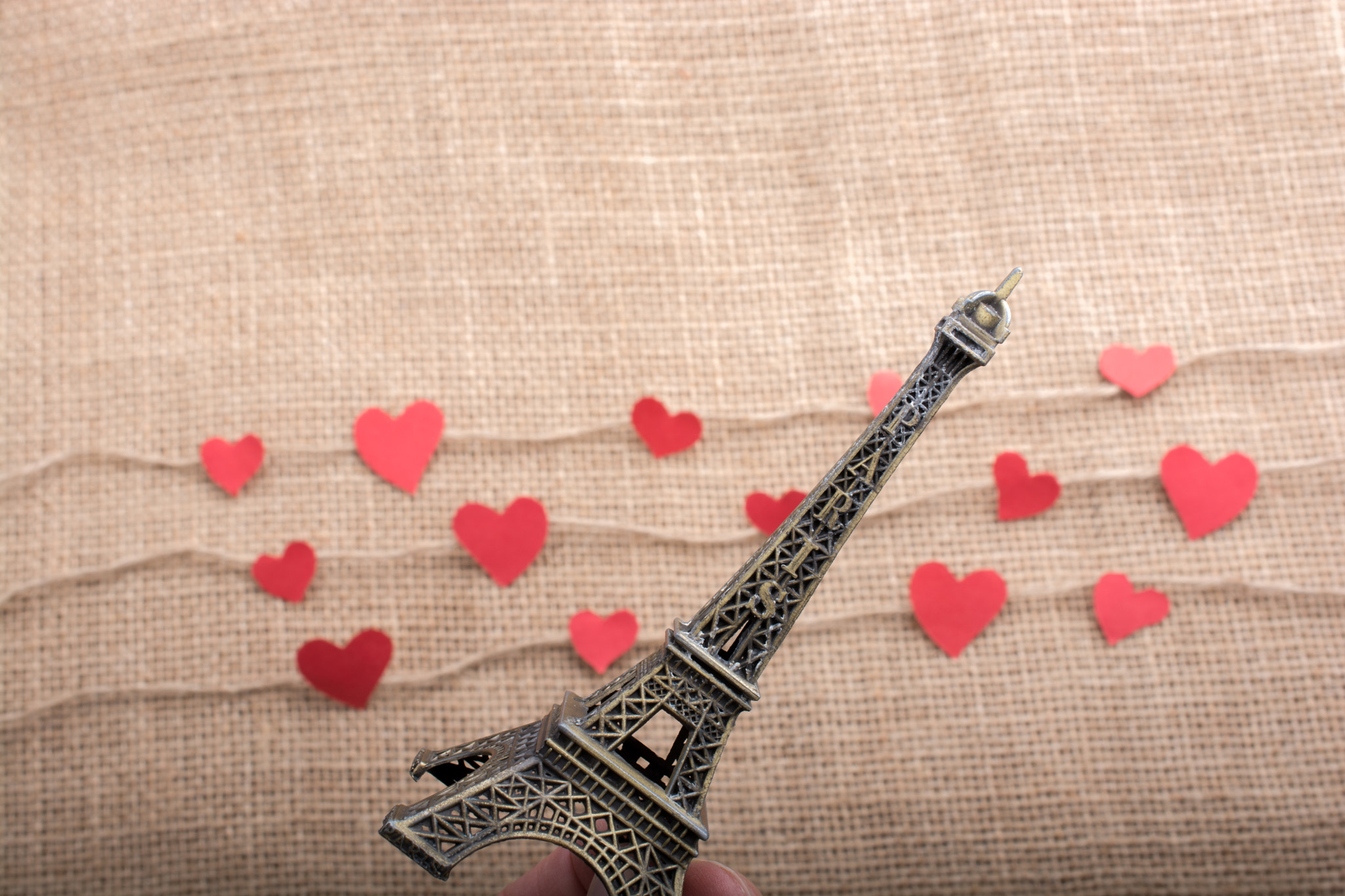 Love concept with Eiffel tower and heart shaped icons