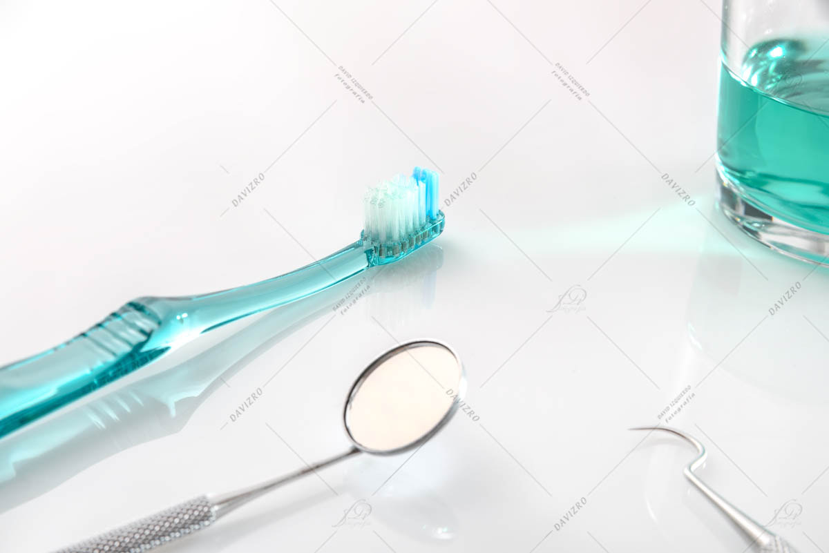 White dentist table with tools and teeth cleaning concept elevat