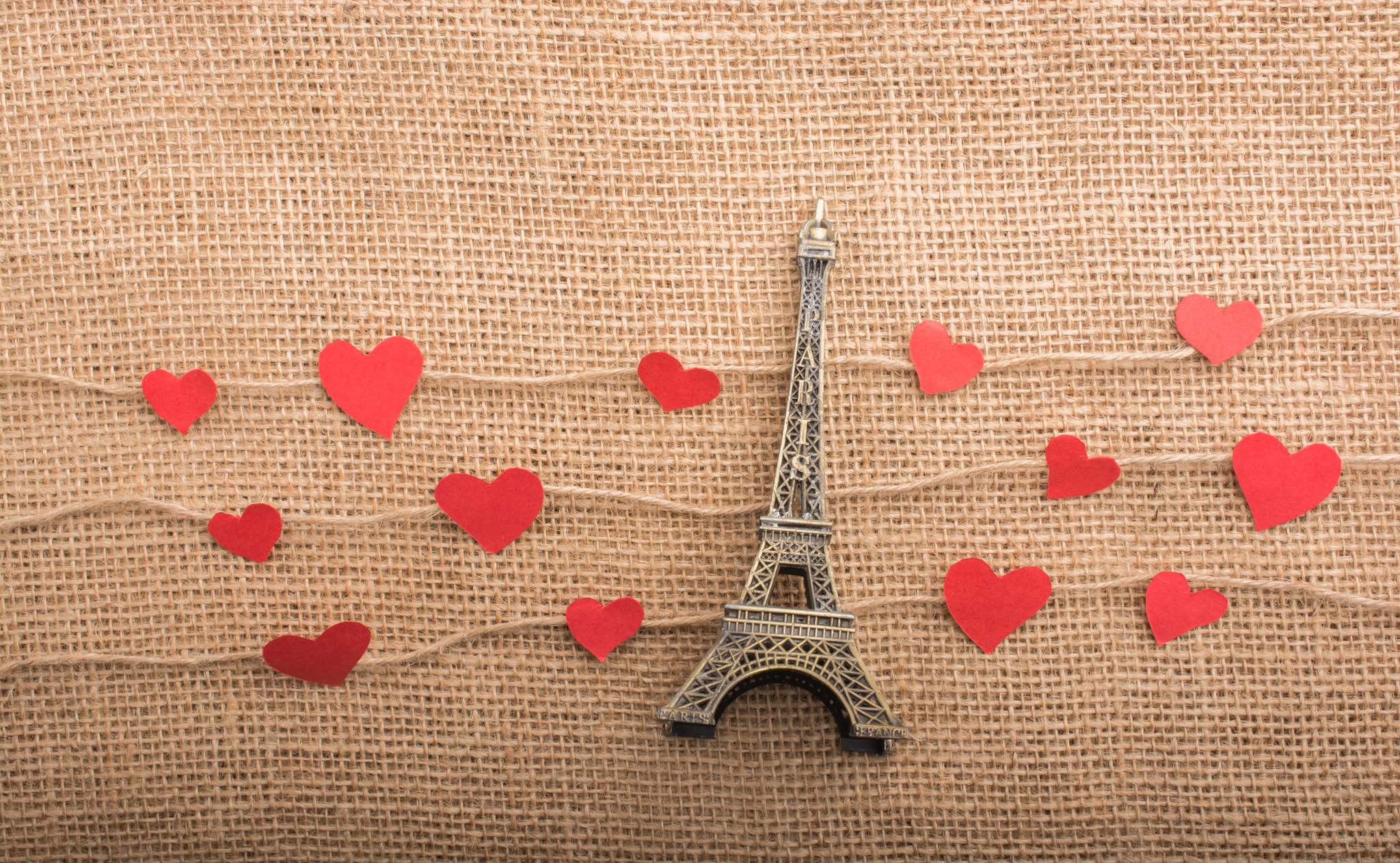 Love concept with Eiffel tower and heart shaped icons