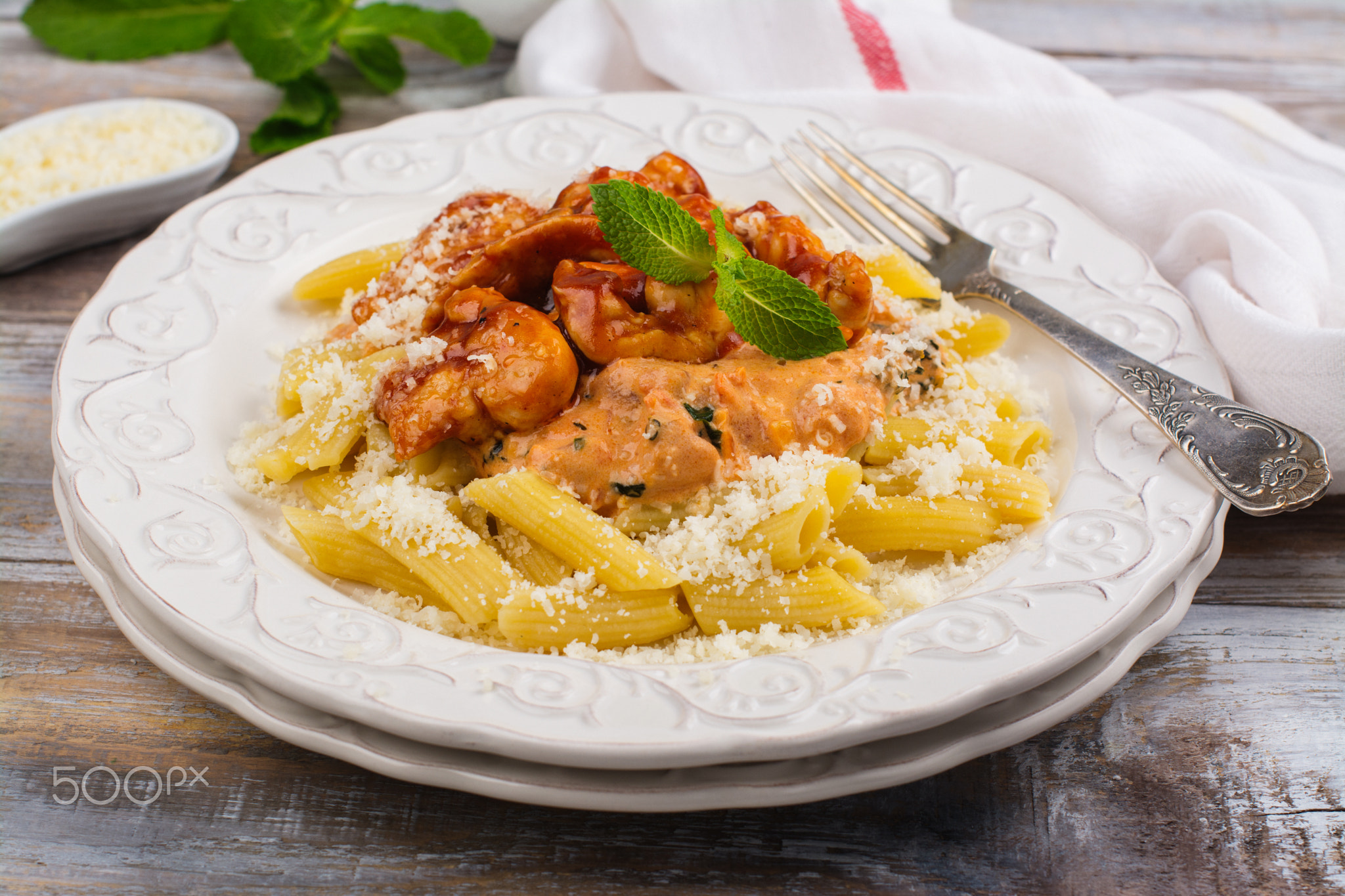 Cooked italian pasta with chicken and tomato sauce