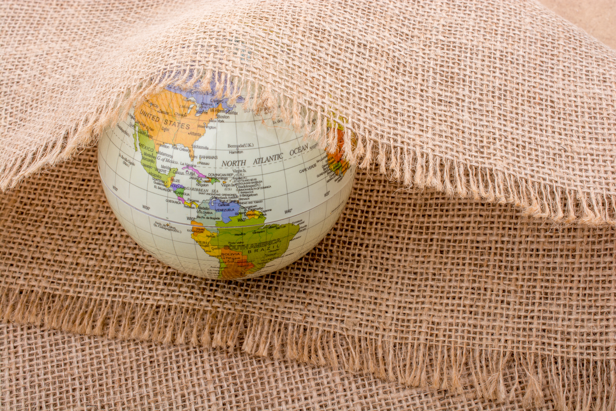 Globe placed under a linen canvas
