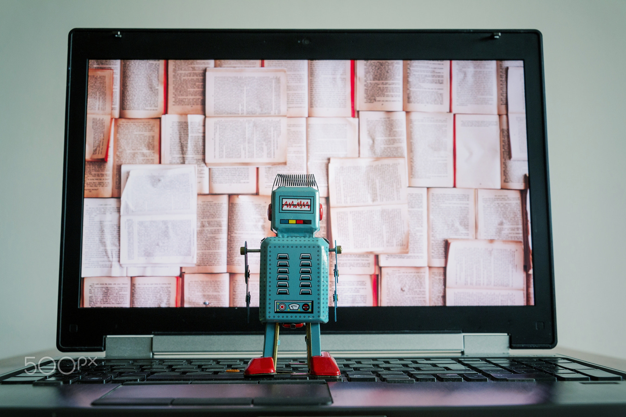 Robots with books screen, big data and deep learning concept