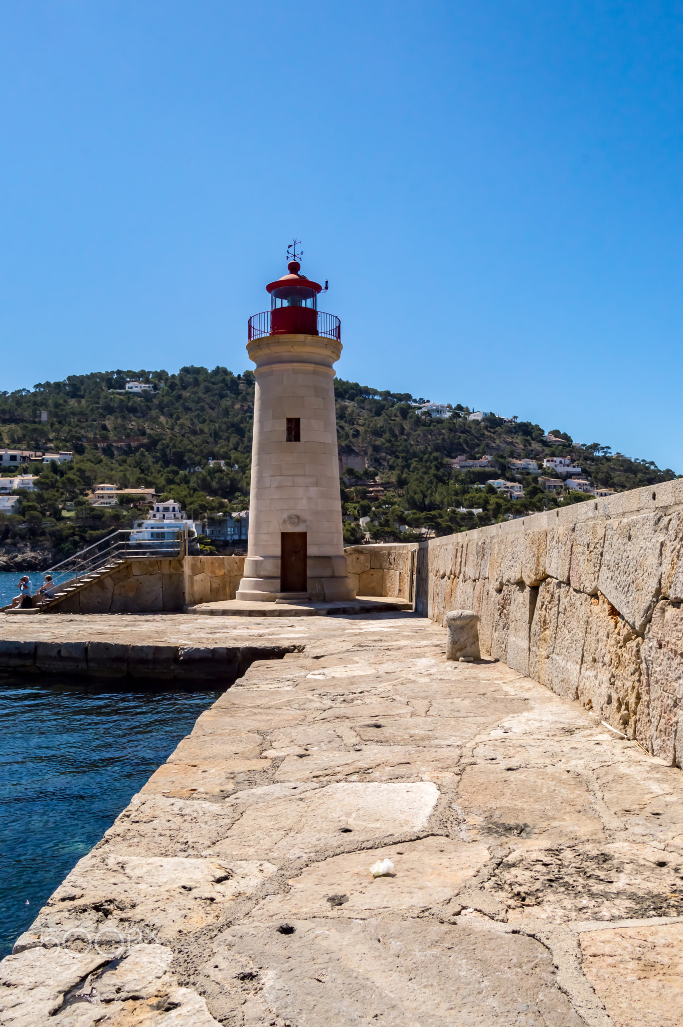Throw to the lighthouse at the port