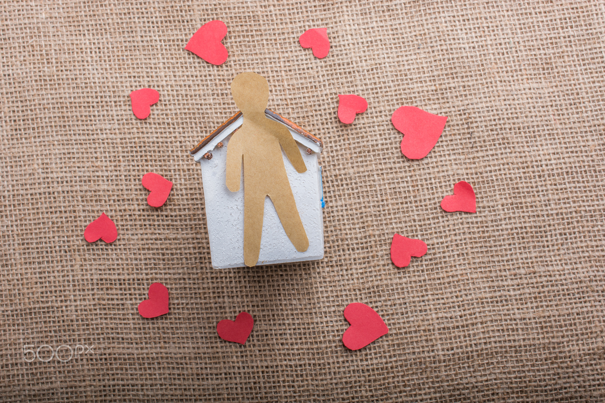 Love concept with paper shaped man, heart and house