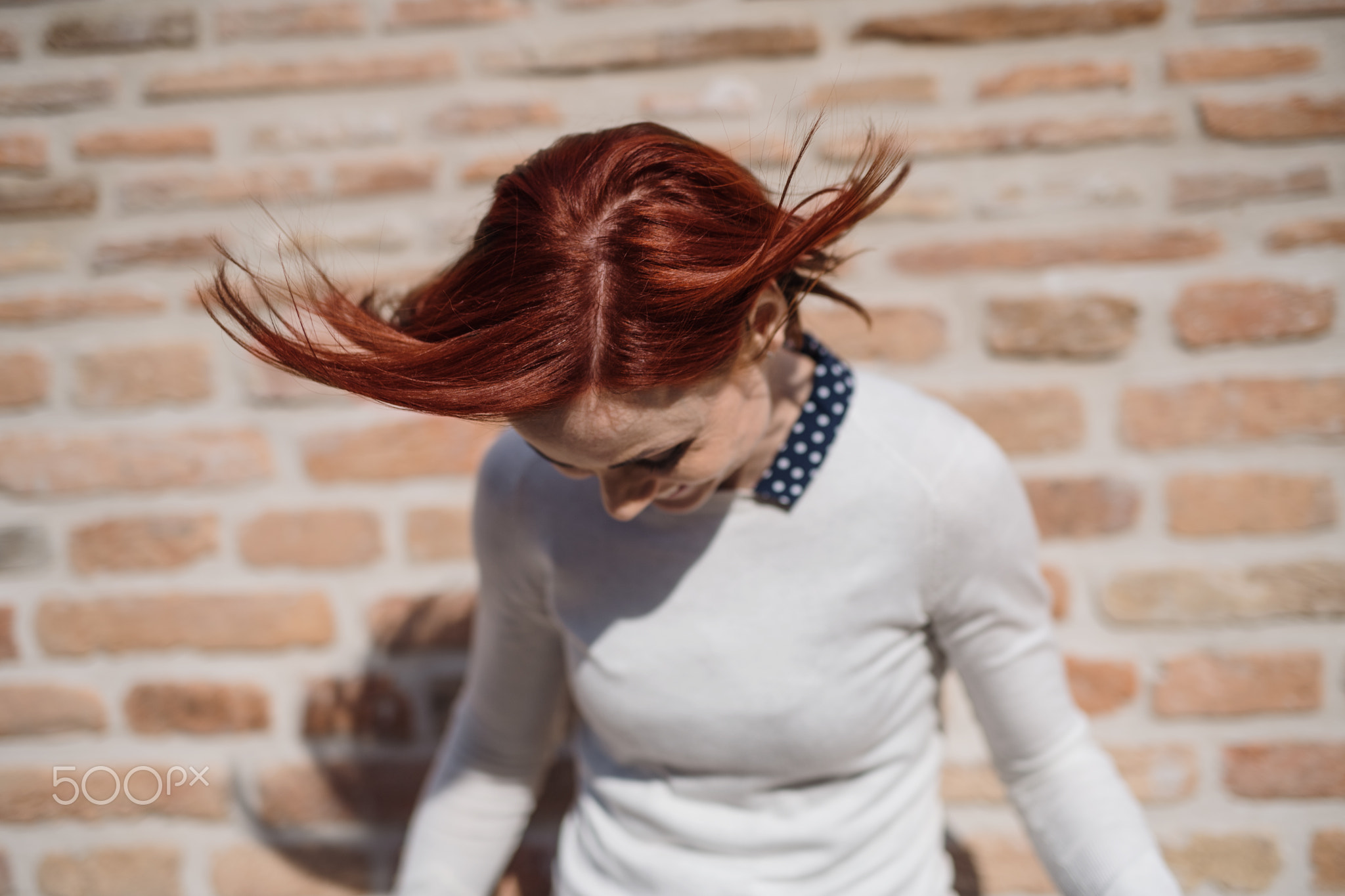 A portrait of young business woman standing outdoors. Copy space.