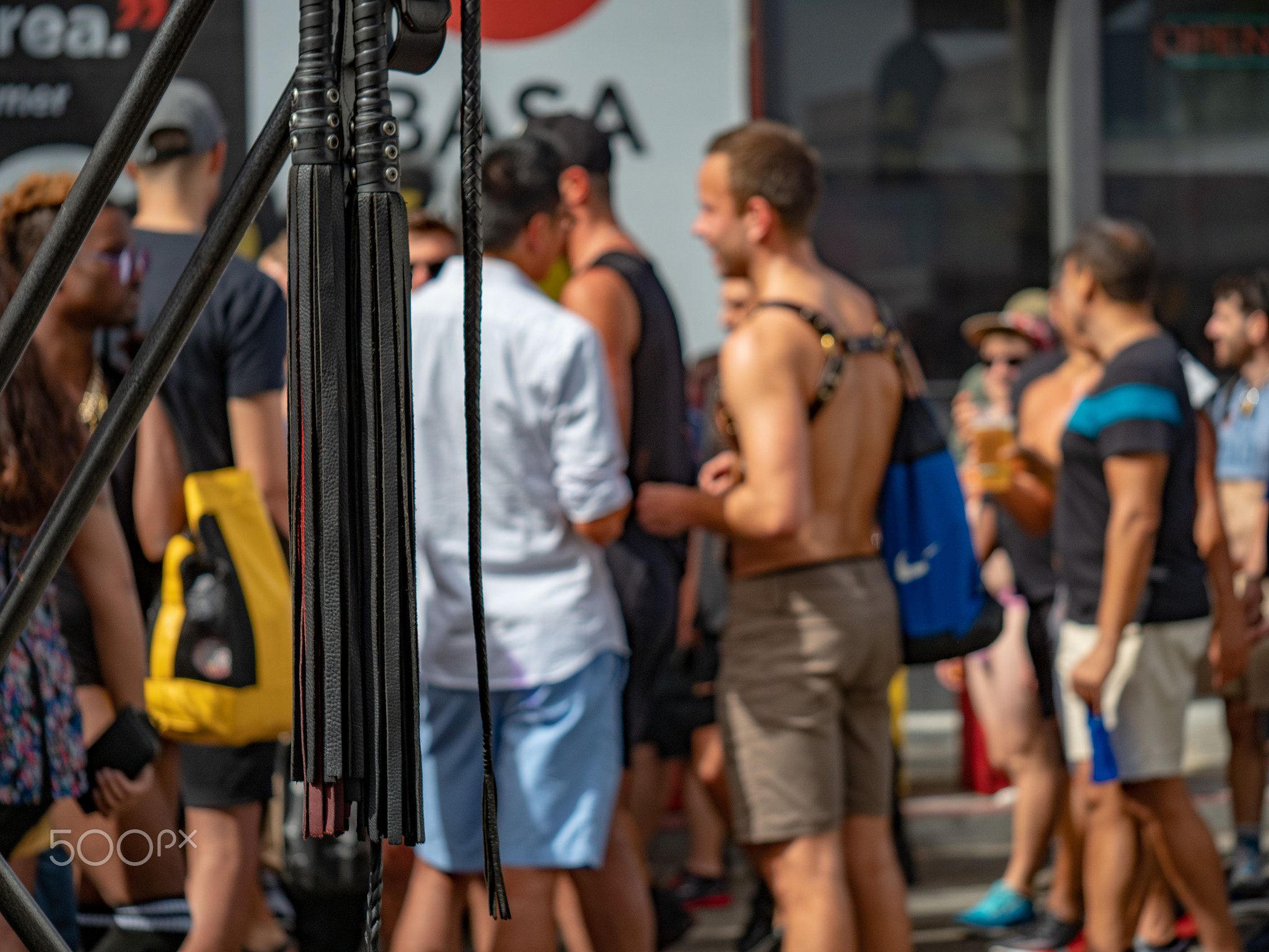 Black leather whips hang outside Folsom Street Fair BDSM festival