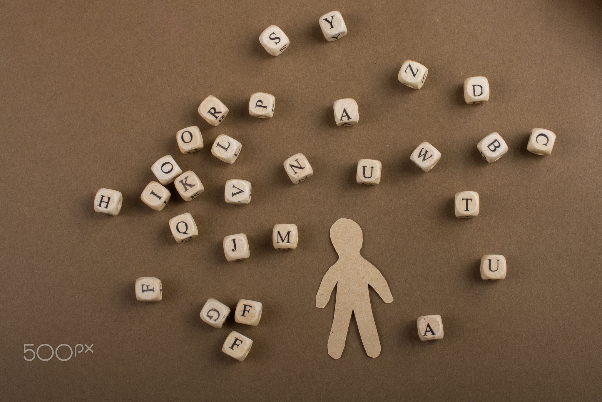 Wooden letter cubes   and man figurine