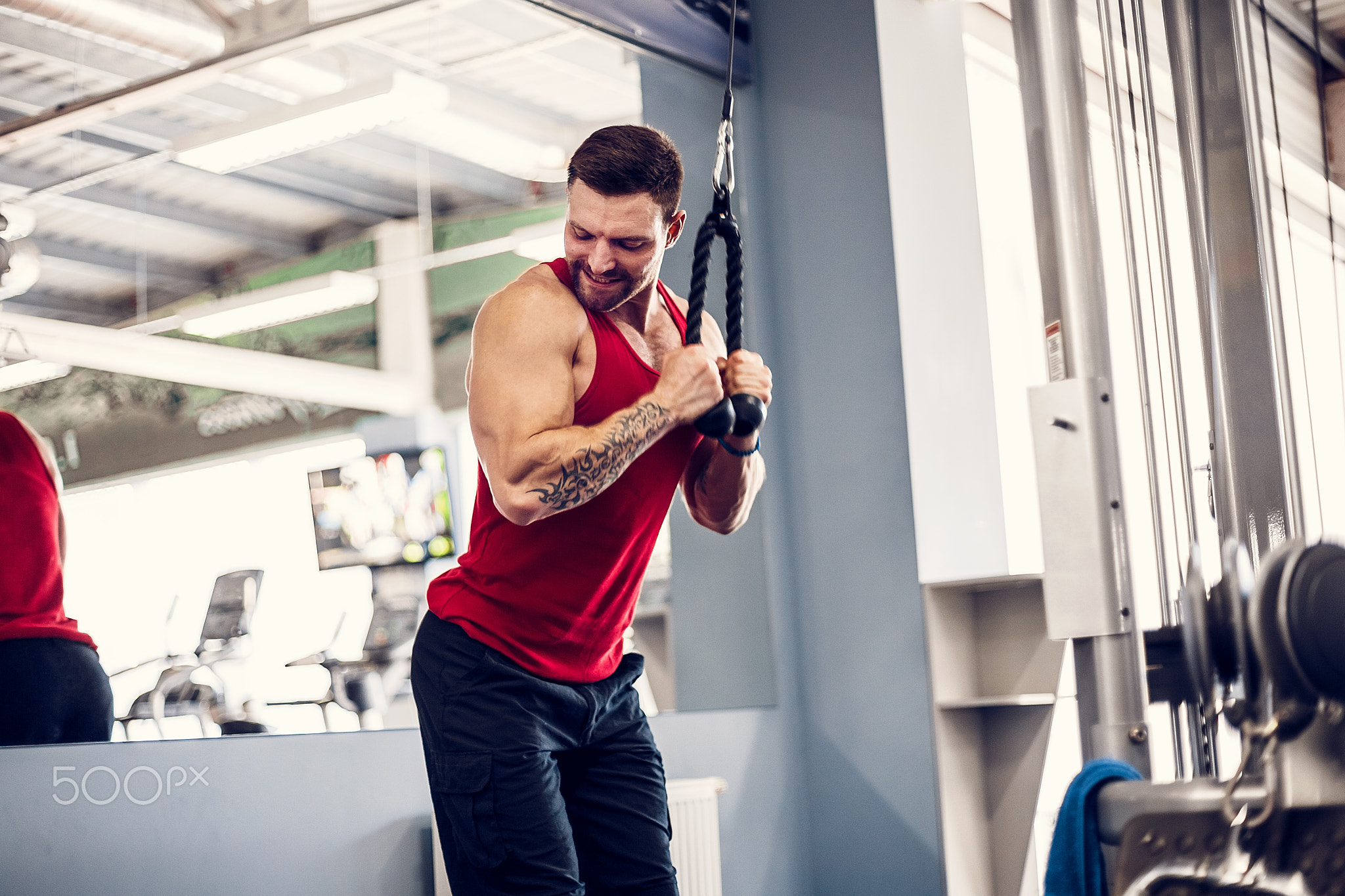 Handsome Muscular Fitness Bodybuilder Doing Heavy Weight Exercise For Triceps