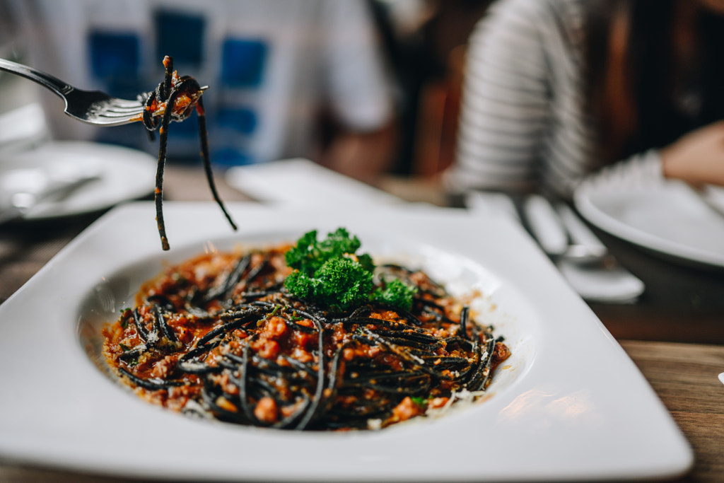 Eating spaghetti stock photo by Metwara Narksook on 500px.com