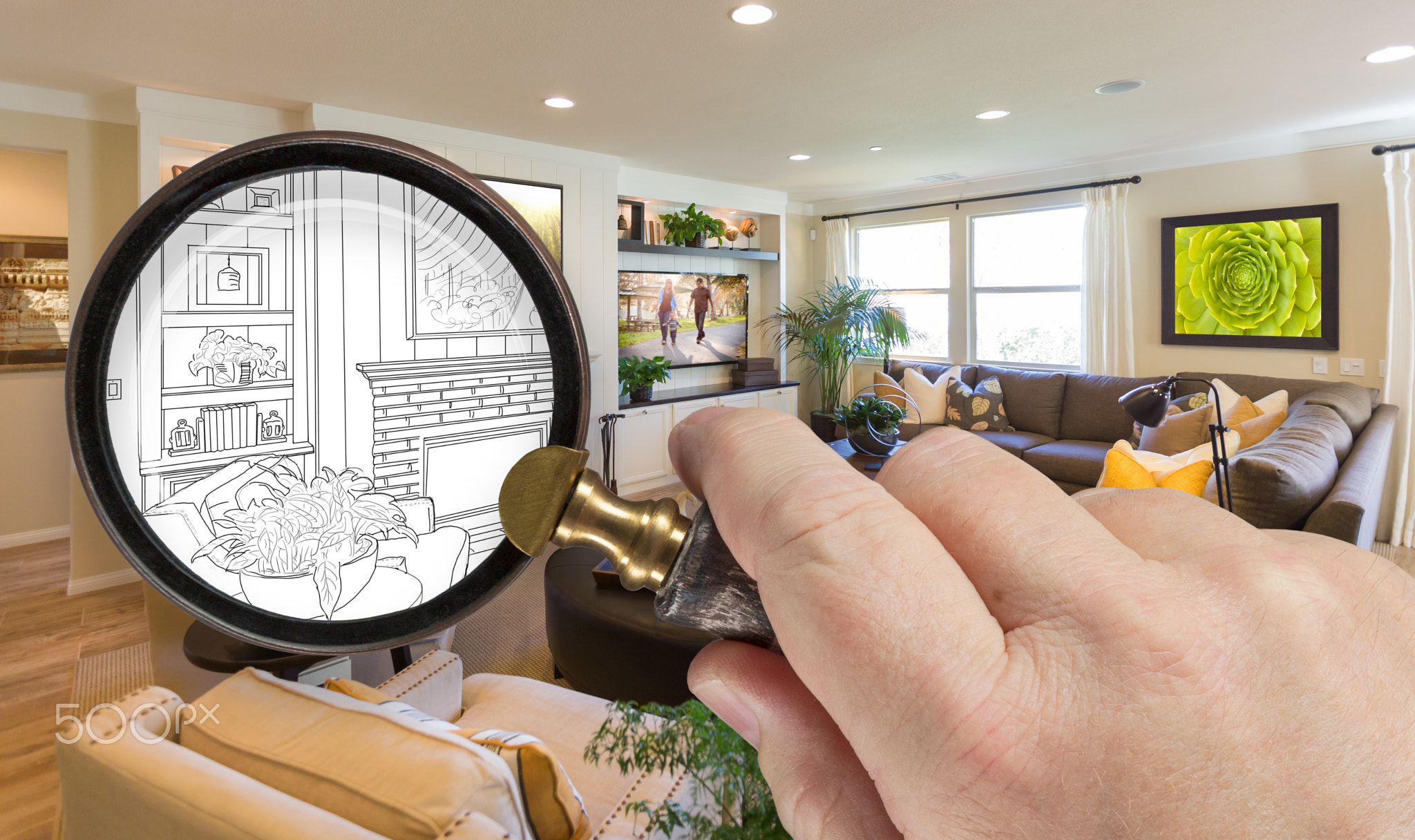 Hand Holding Magnifying Glass Revealing Custom Living Room Desig