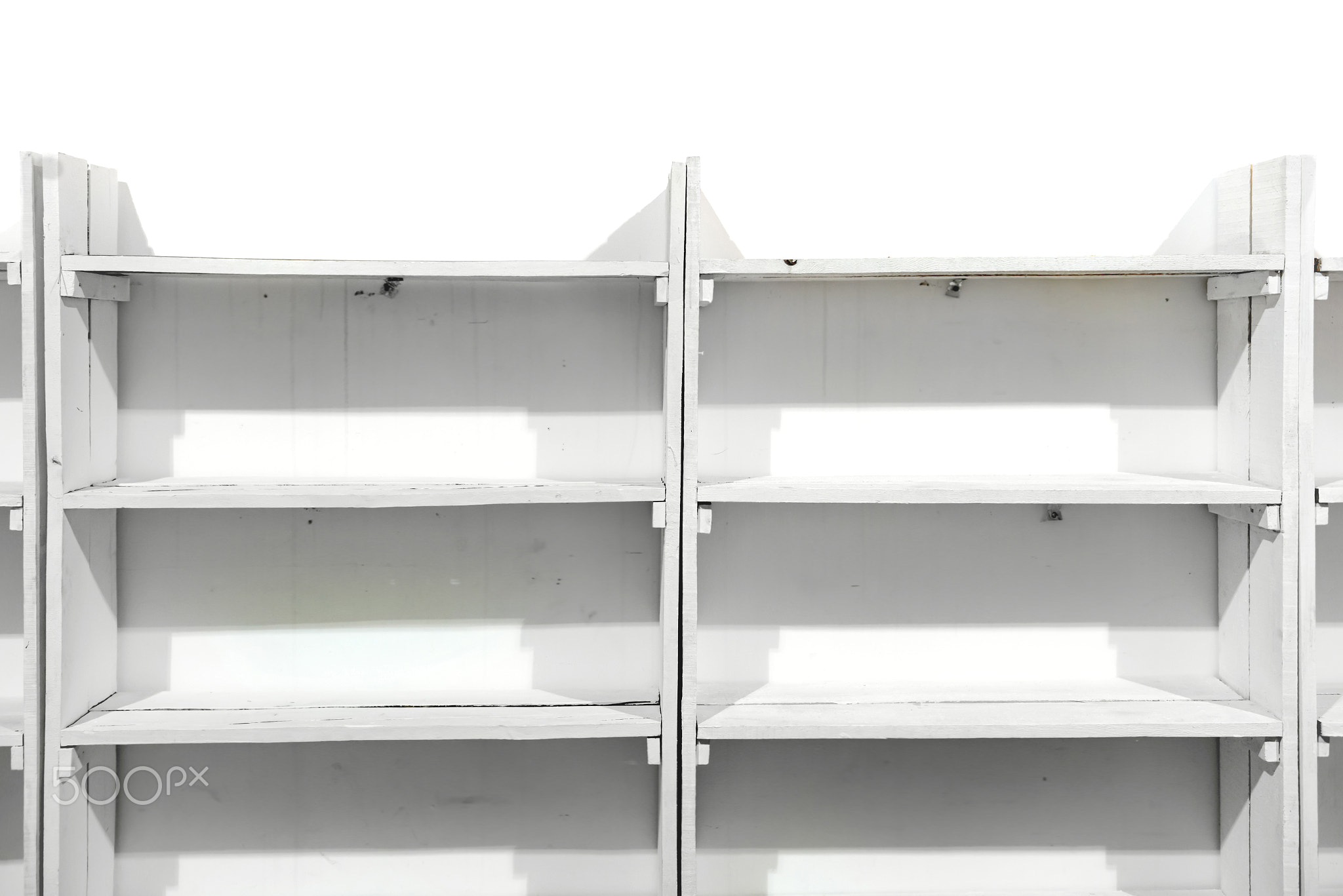 White wooden empty shelves