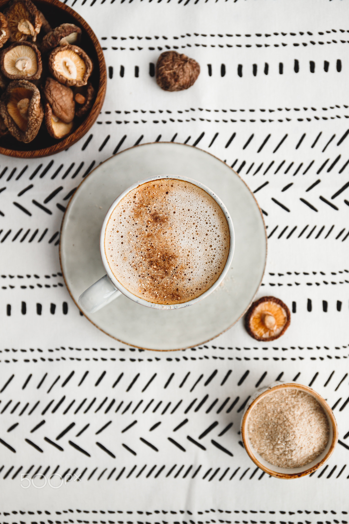 Top view of mushroom latte with shiitake powder and unsweetened coconut-almond blend milk....