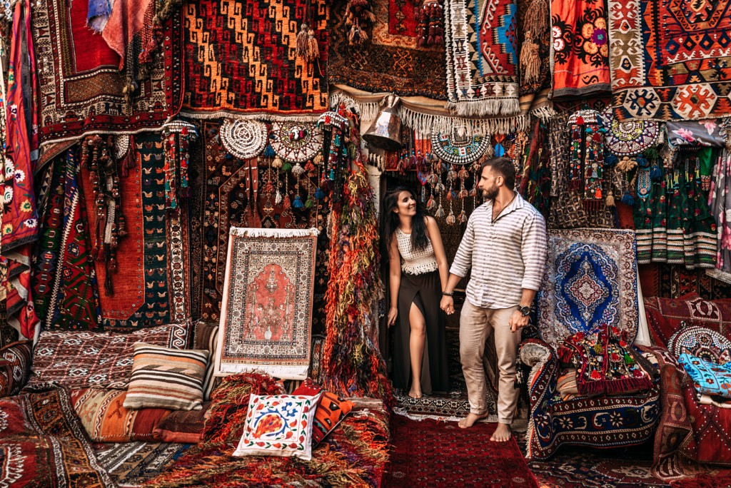 Man and woman in the store. Couple in love in Turkey. Man and woman in the Eastern country. Happy... by MISHA SOTNIKOV on 500px.com