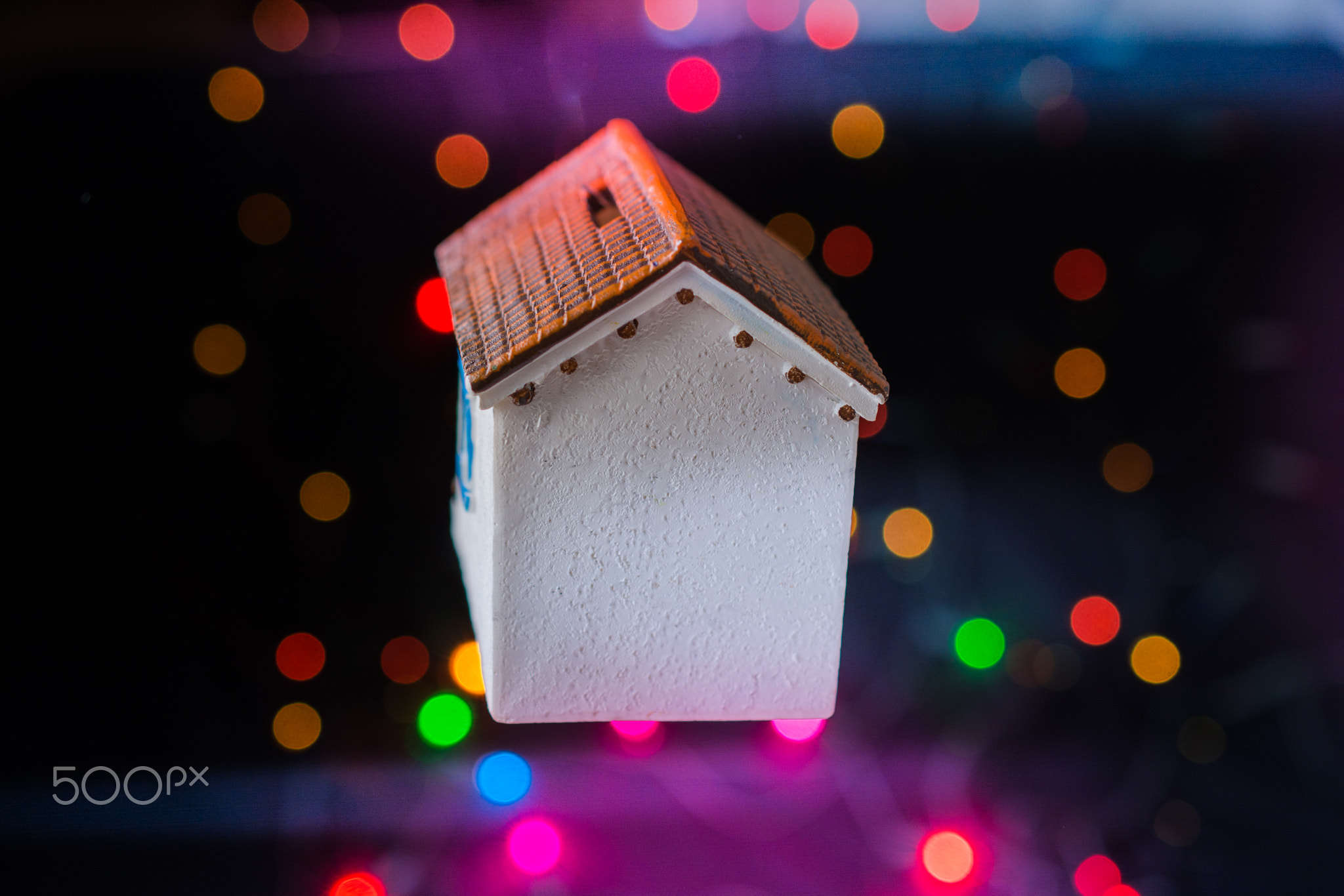 Model house on a bokeh light background