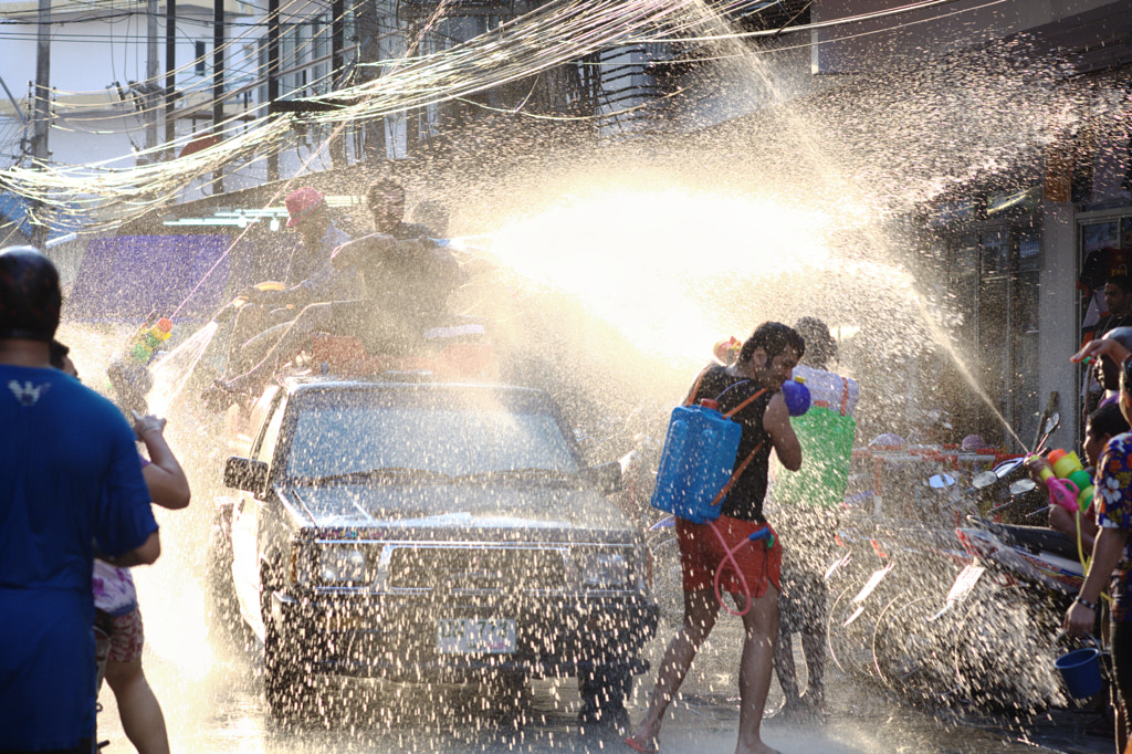 Photograph Songkran street fighting by Mishel Breen on 500px