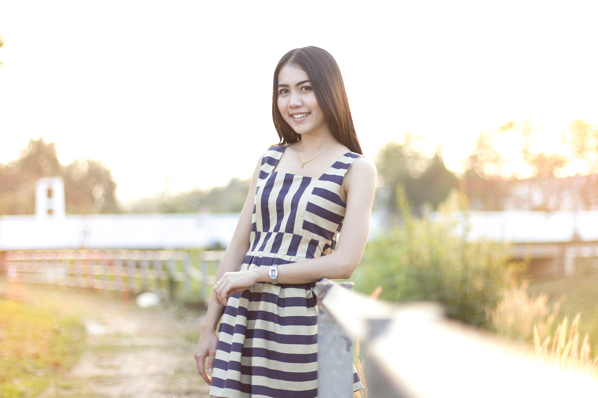 Fashion of a autumn girl wearing a striped Thailand.