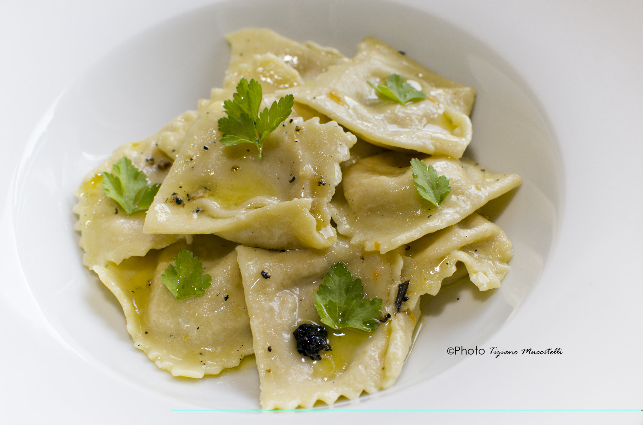 Ravioli ripieni di zucca e porcini con salsa al tartufo nero by Chef