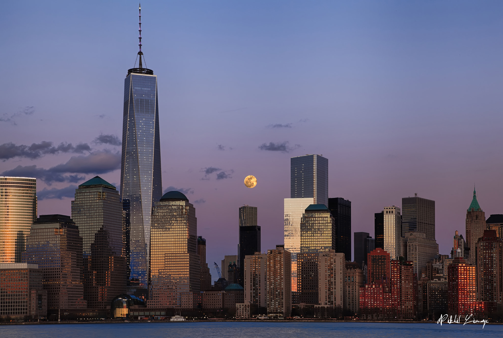 NYC skyline on full moon night.