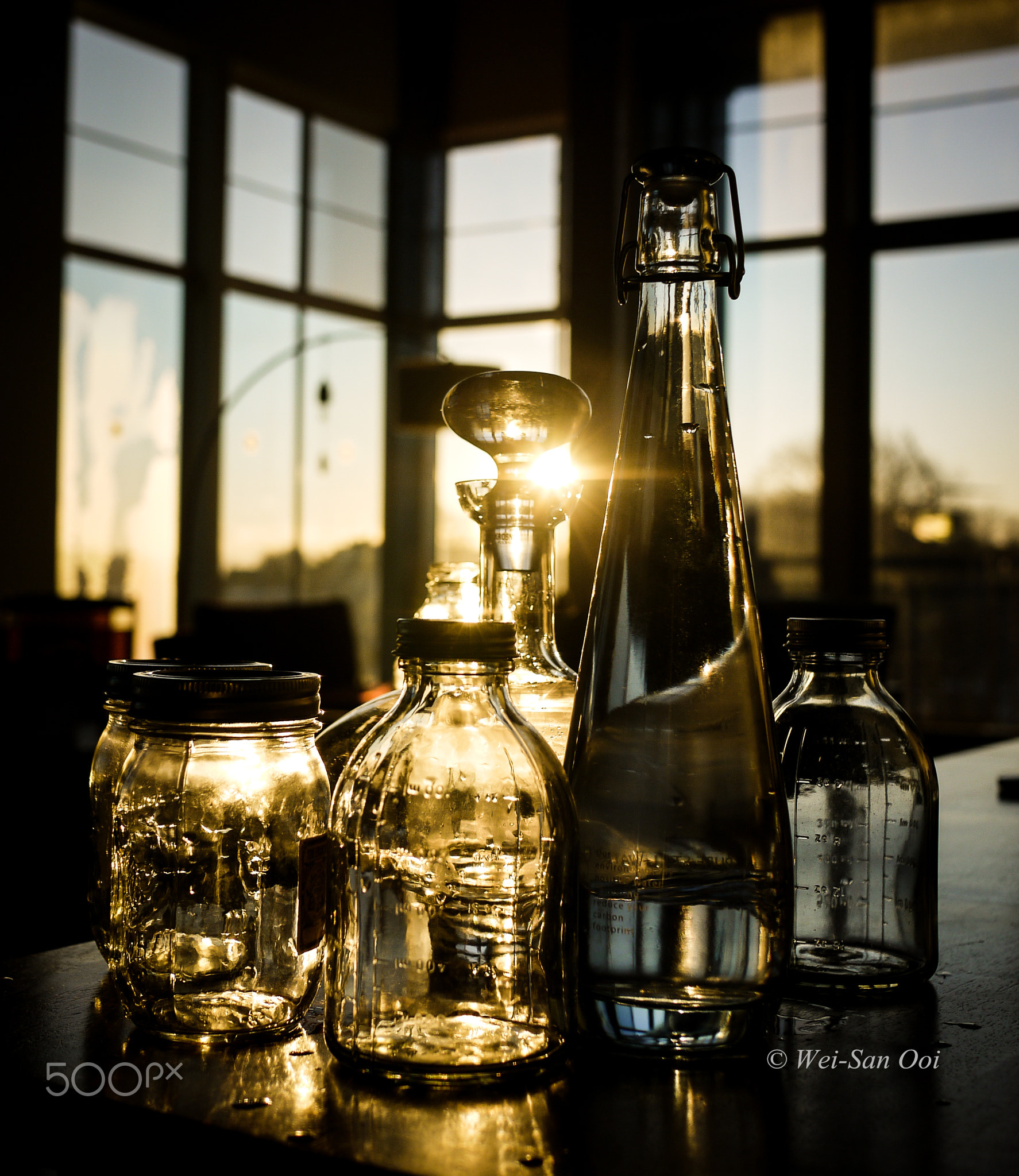 Golden bottles and mason jars