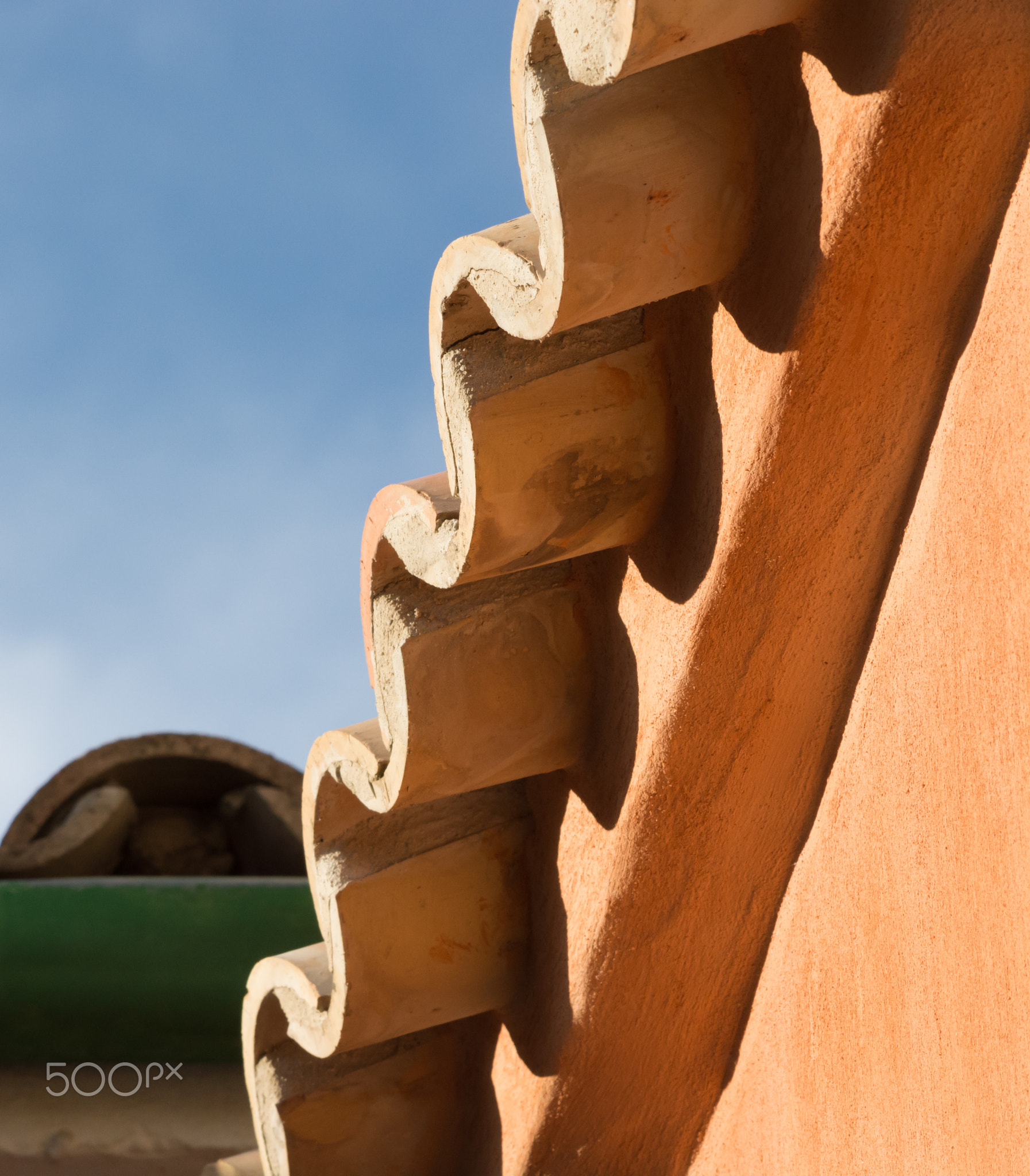 Roof tiles and sky