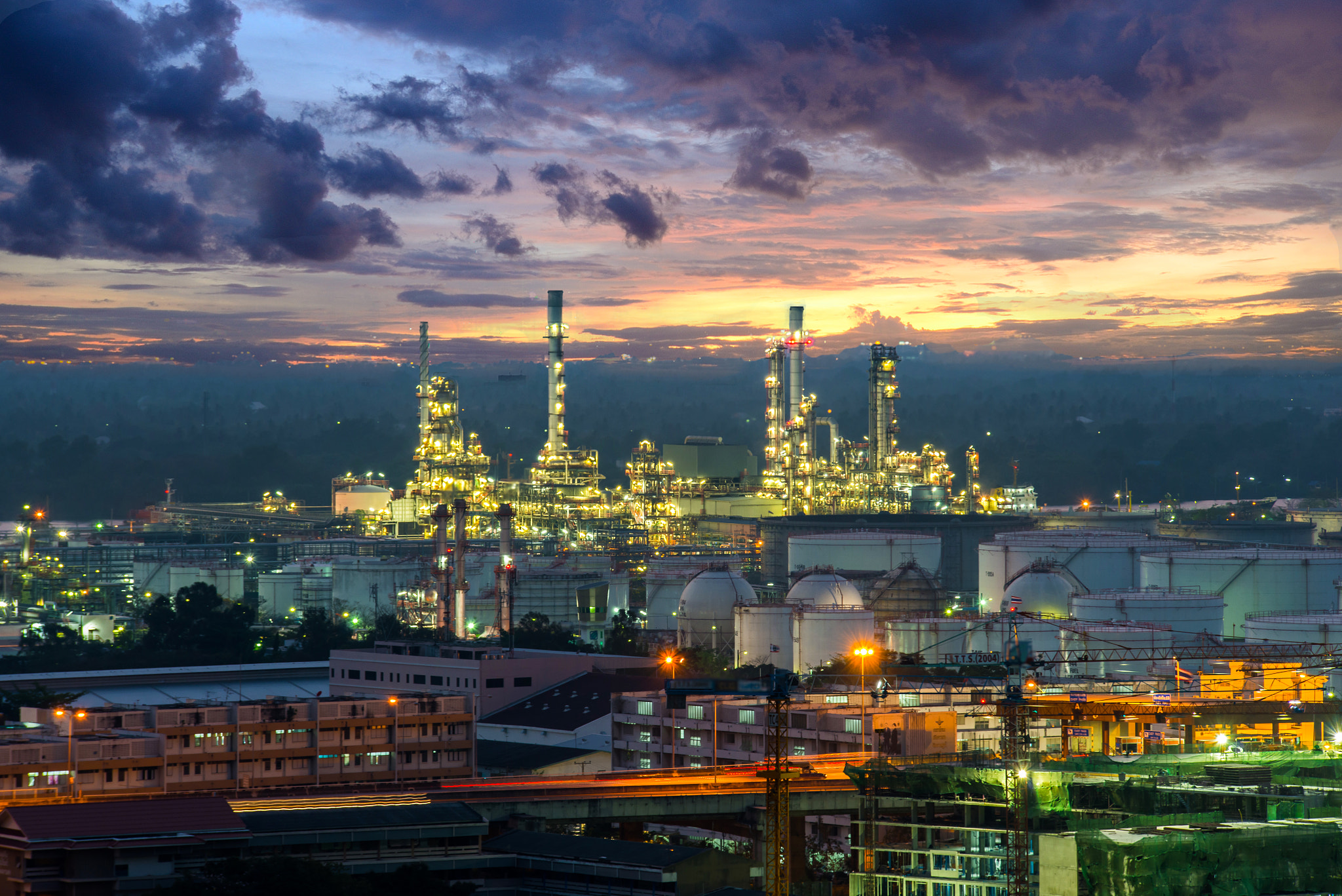 Petrochemical plant ( oil refinery ) industry at twilight time