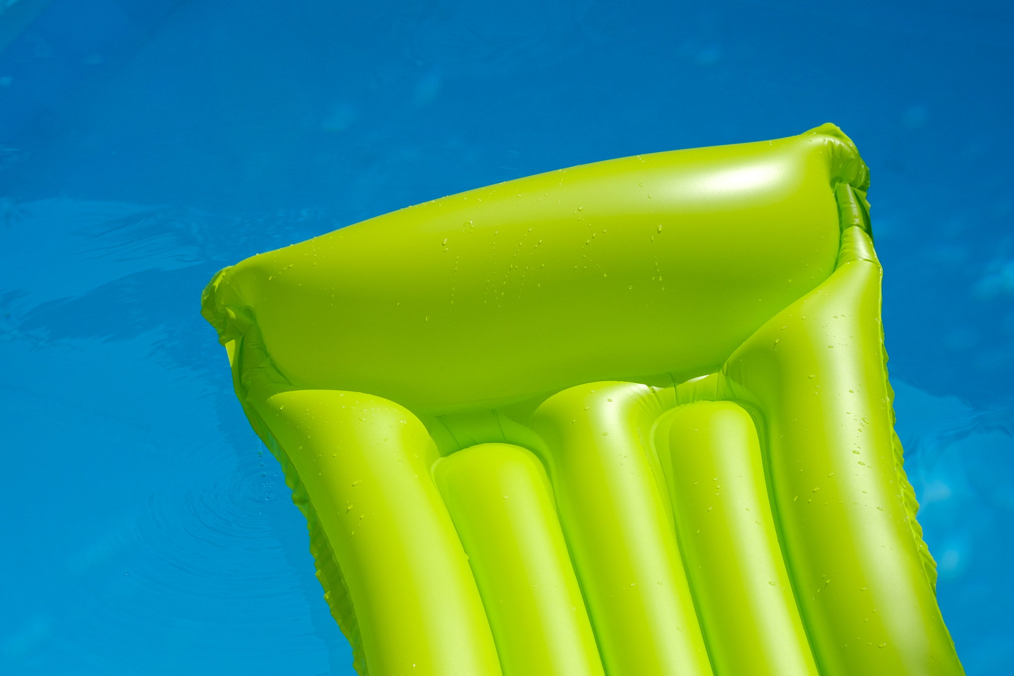 air mattress is floating in a swimming pool