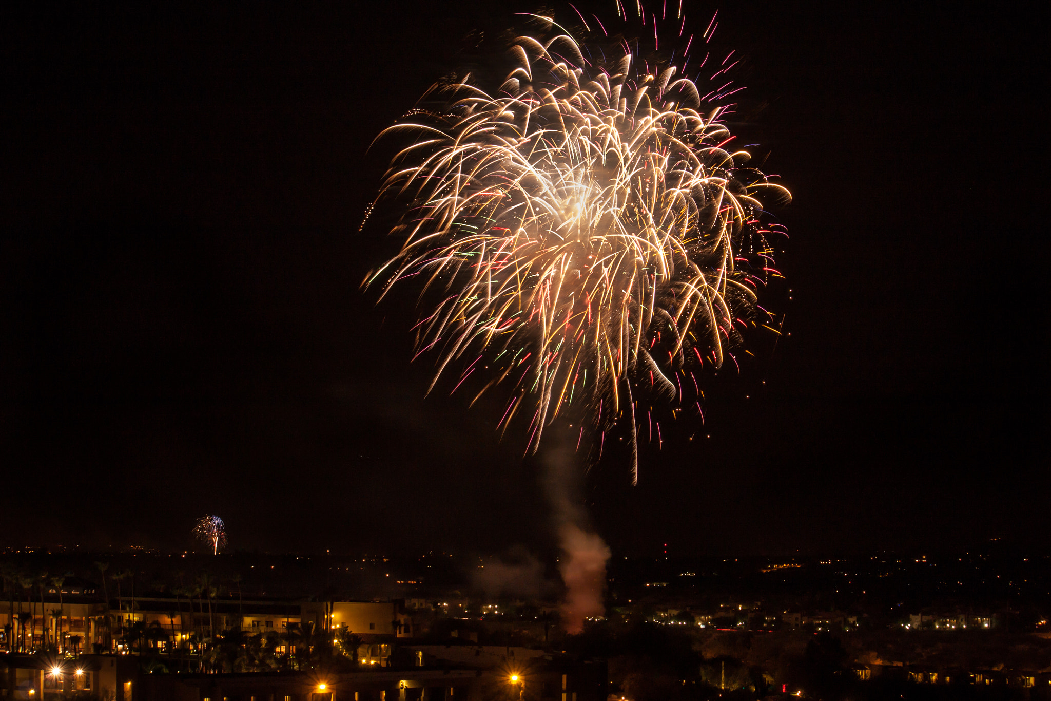 Canon EF-S 55-250mm F4-5.6 IS sample photo. Confetti of fireworks over oro valley photography